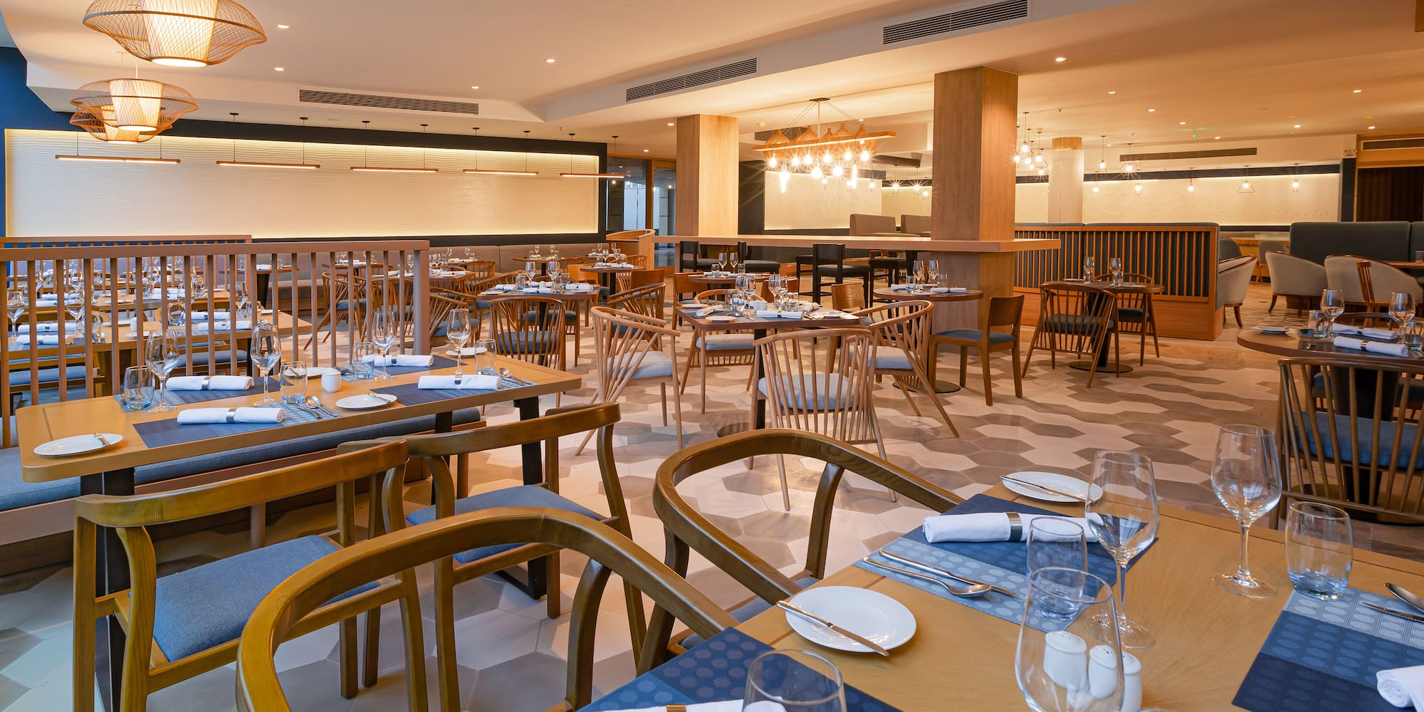 a restaurant with tables and chairs