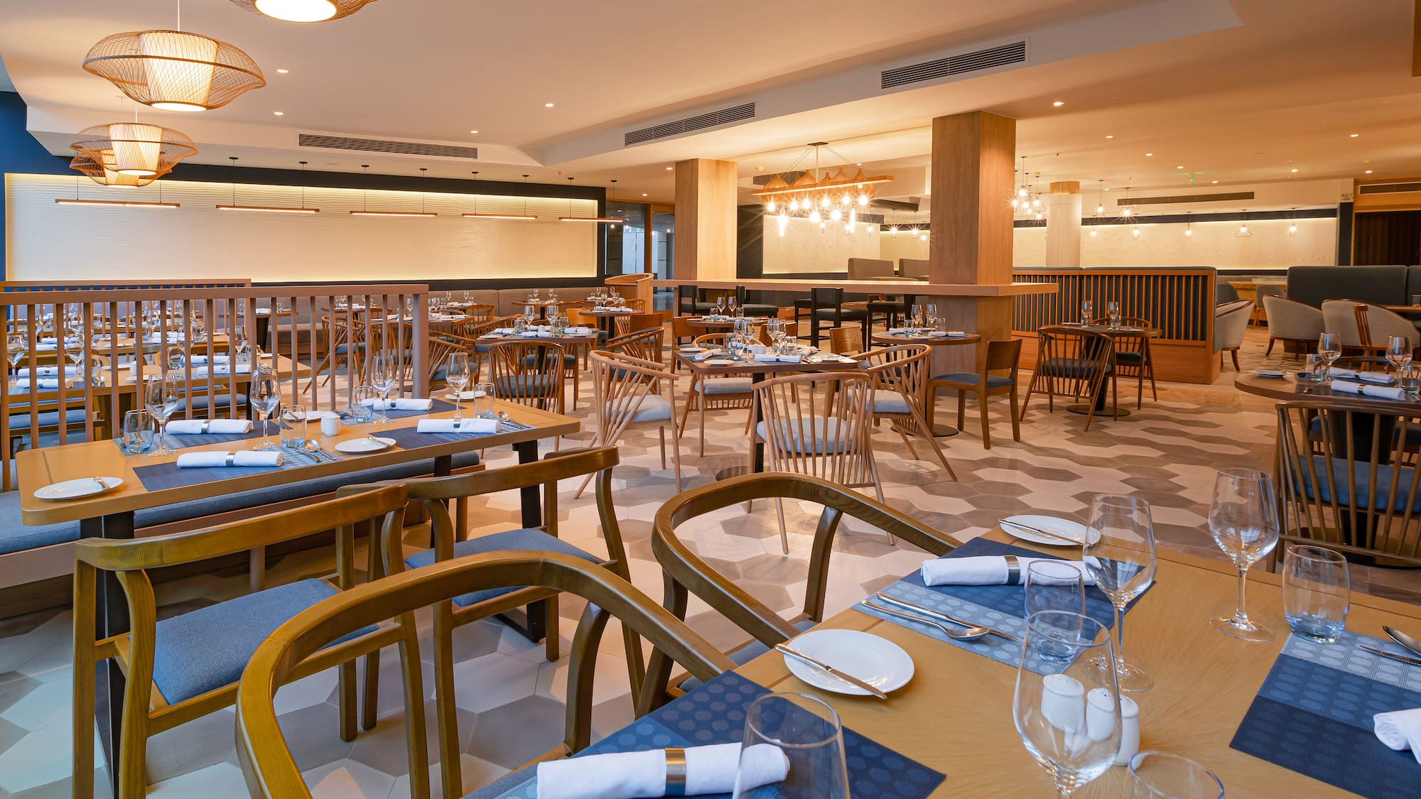 a restaurant with tables and chairs