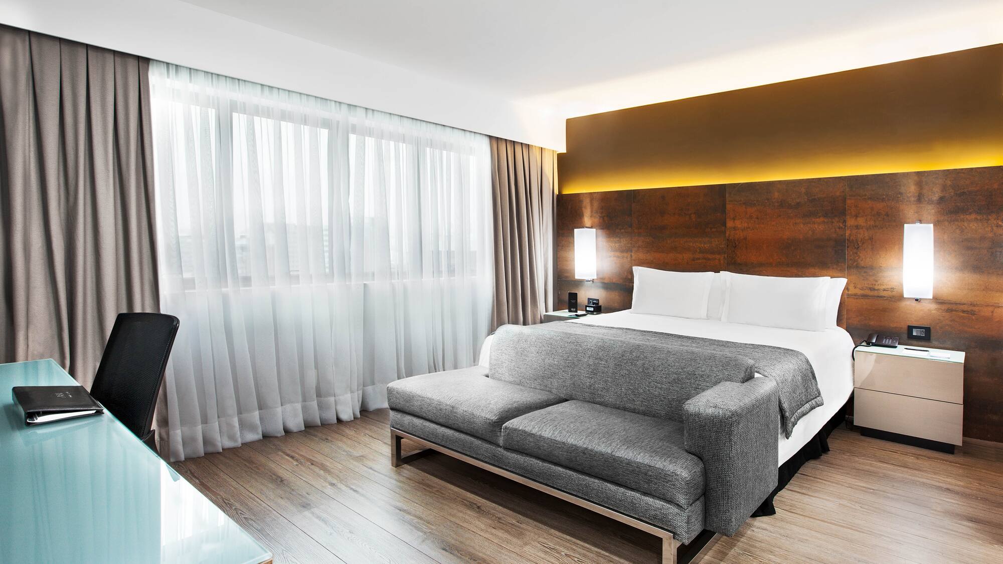 a room with a bed and a couch