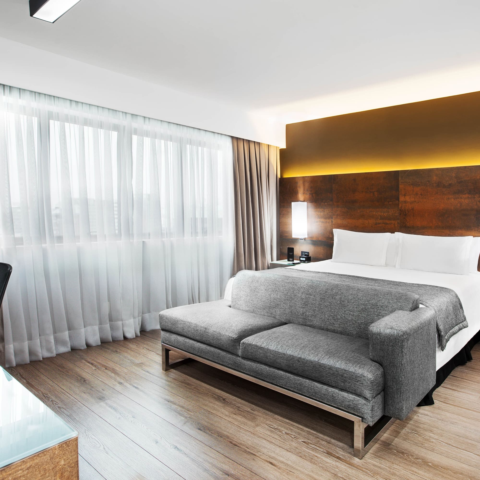 a room with a bed and a couch