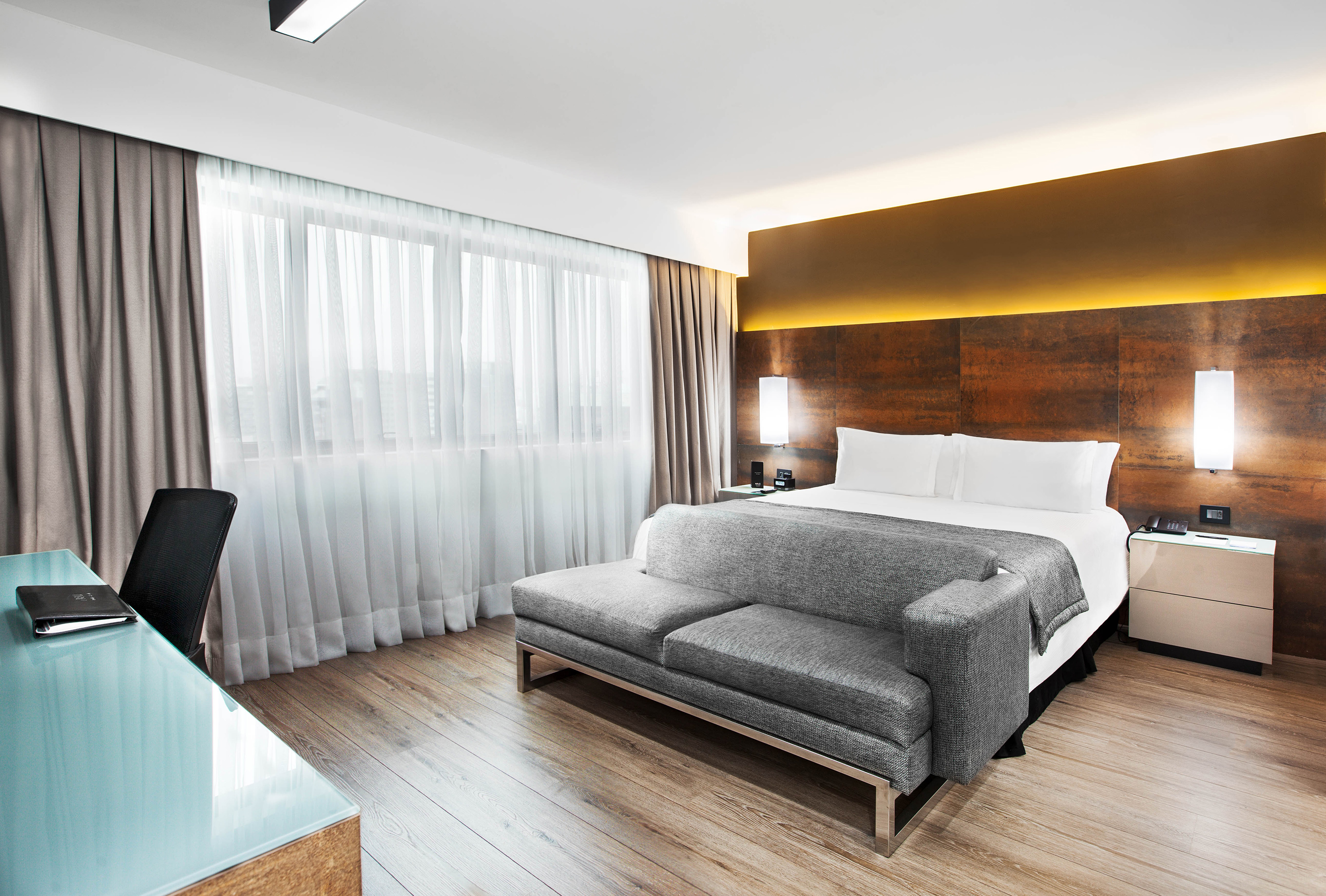 a room with a bed and a couch