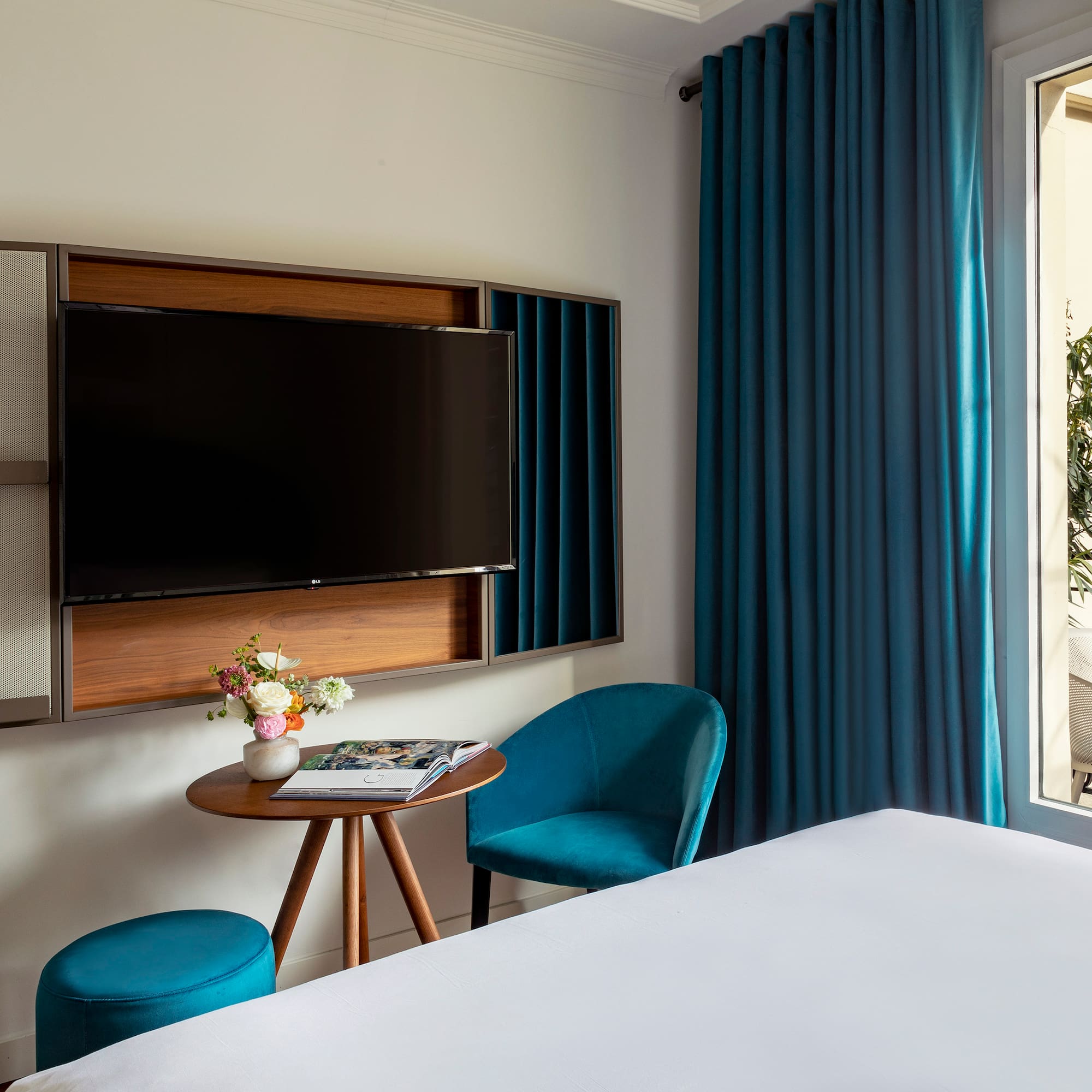 a room with a tv and a table