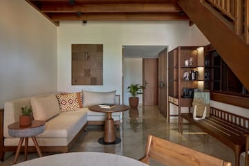 a living room with a couch and a coffee table