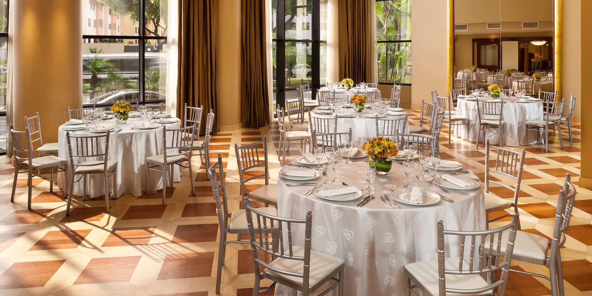 a room with tables and chairs