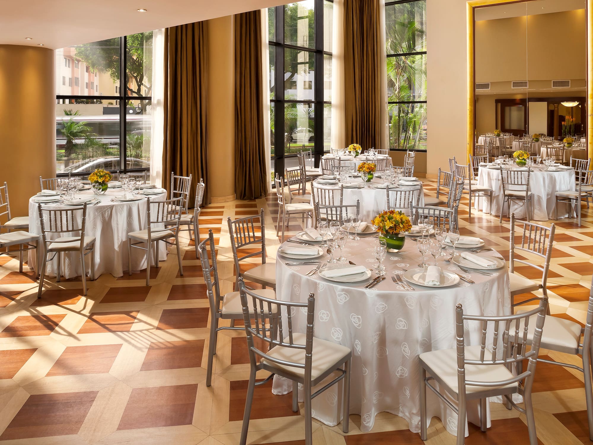 a room with tables and chairs