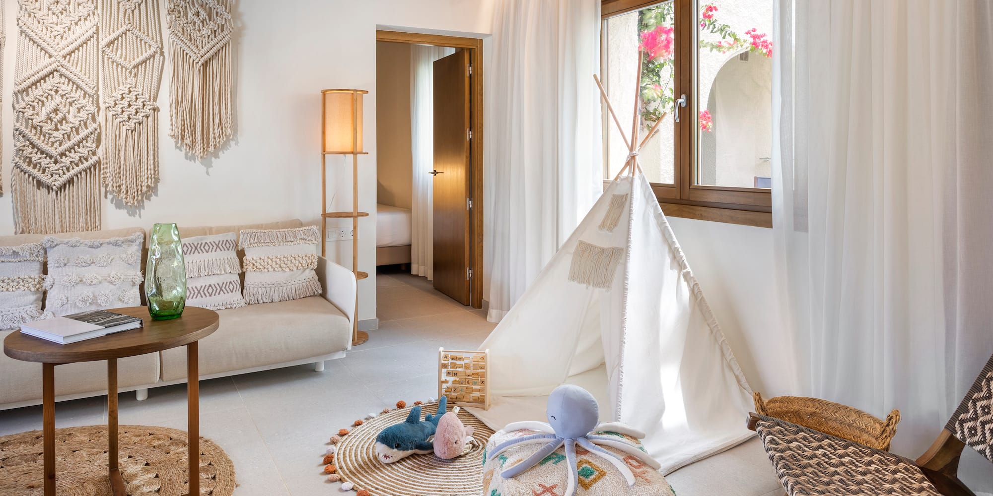 a room with a tent and furniture