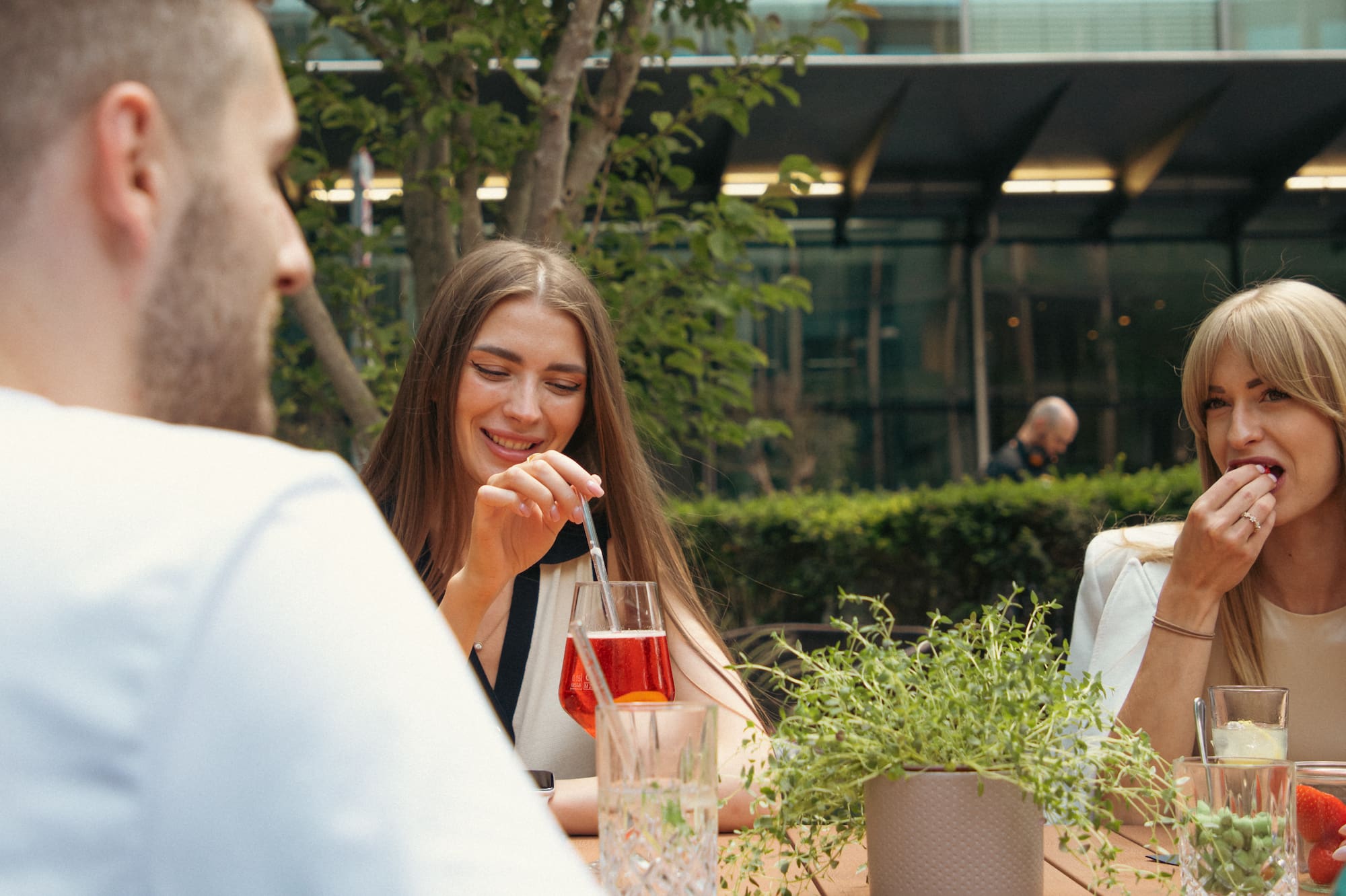 a group of people sitting at a table