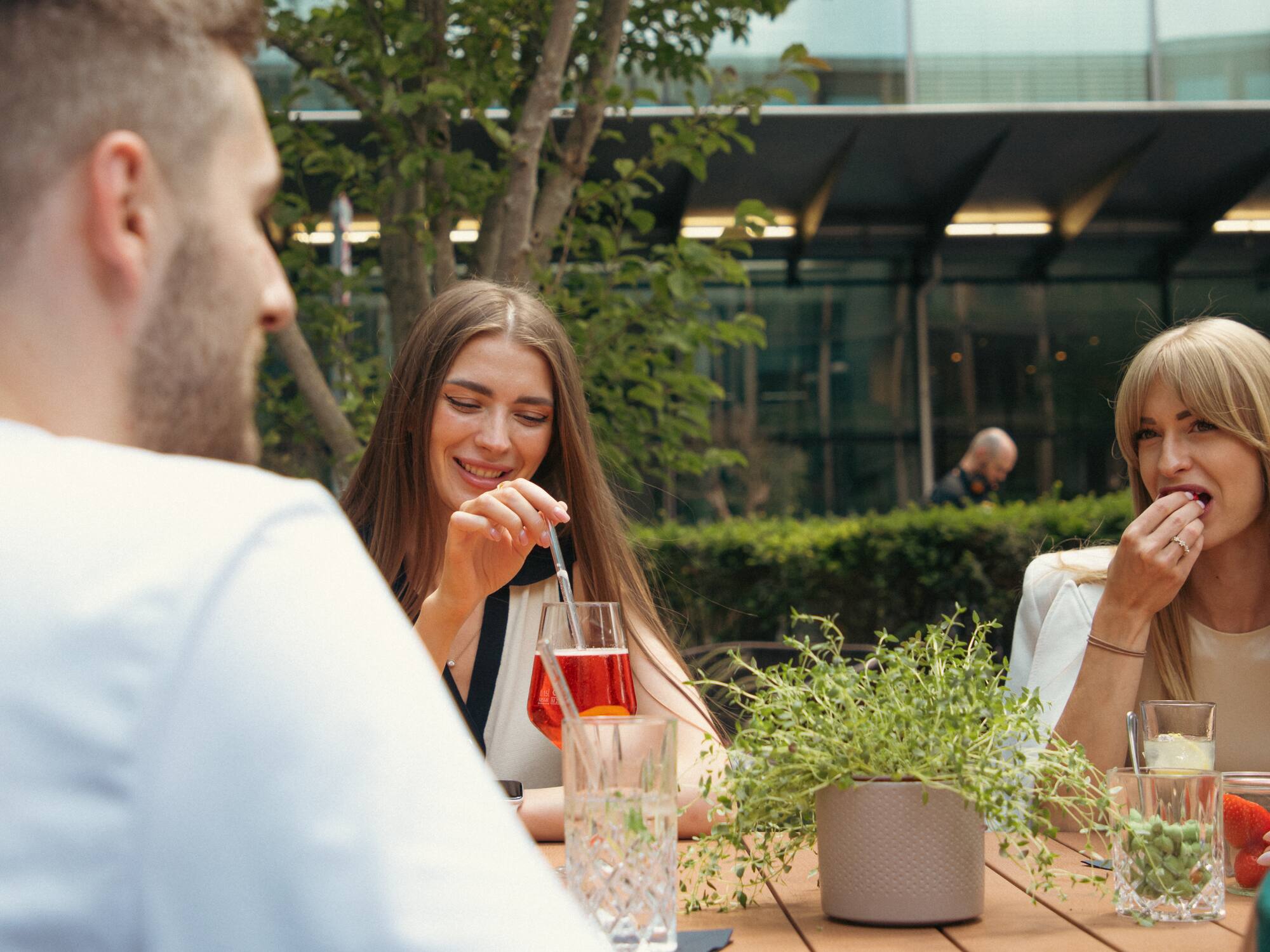 a group of people sitting at a table
