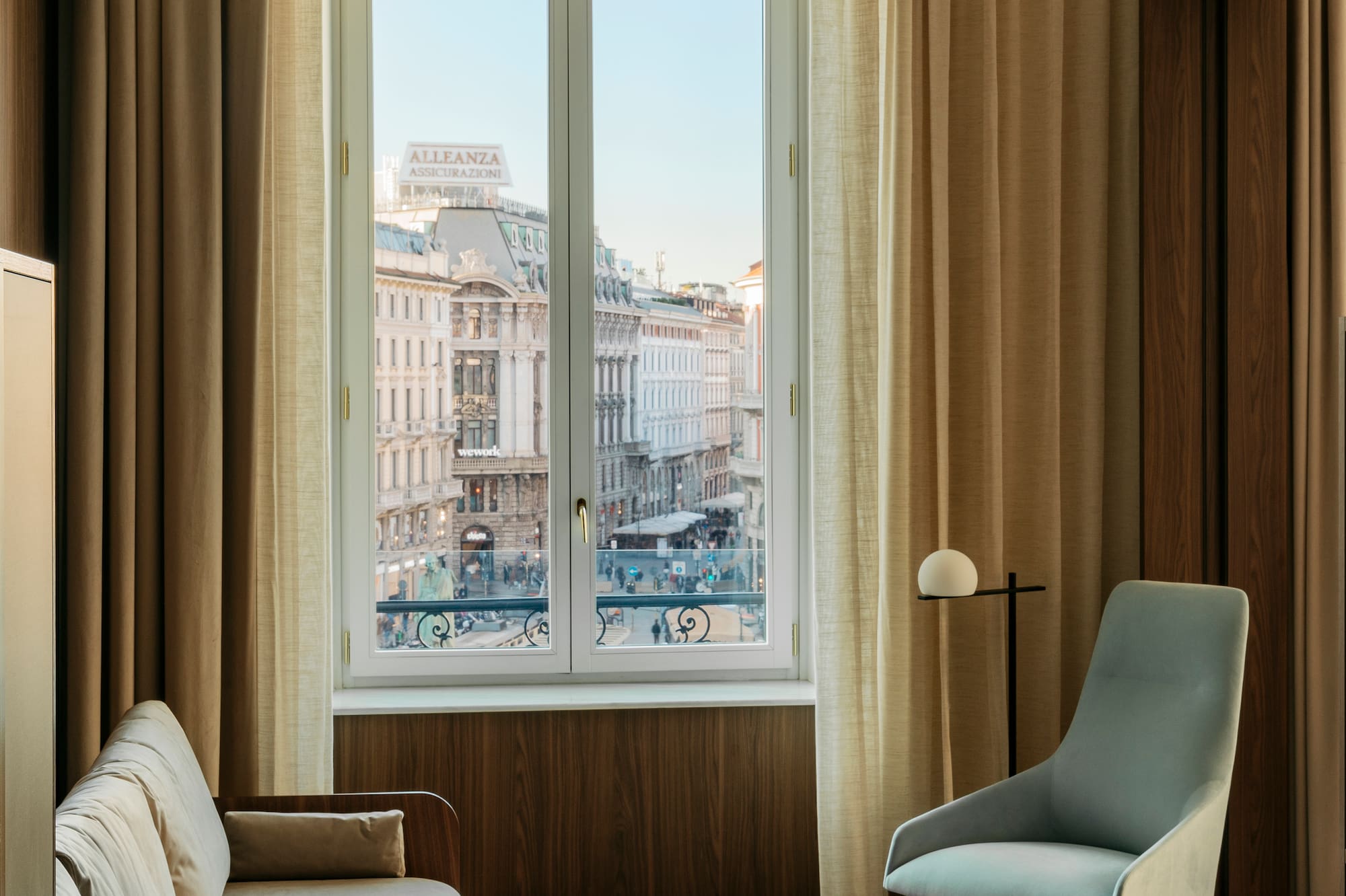 a living room with a couch and a window