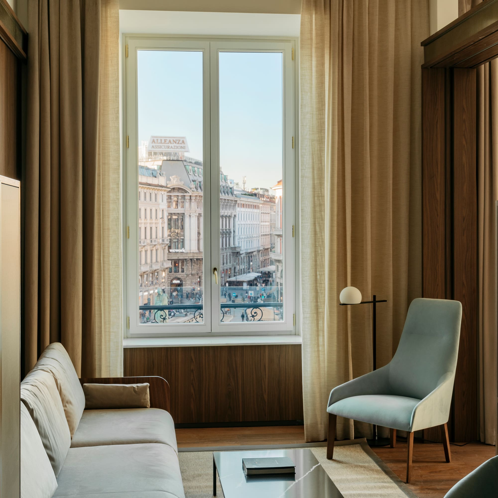 a living room with a couch and a window