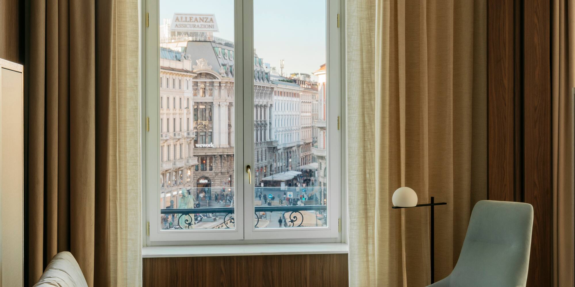a living room with a couch and a window