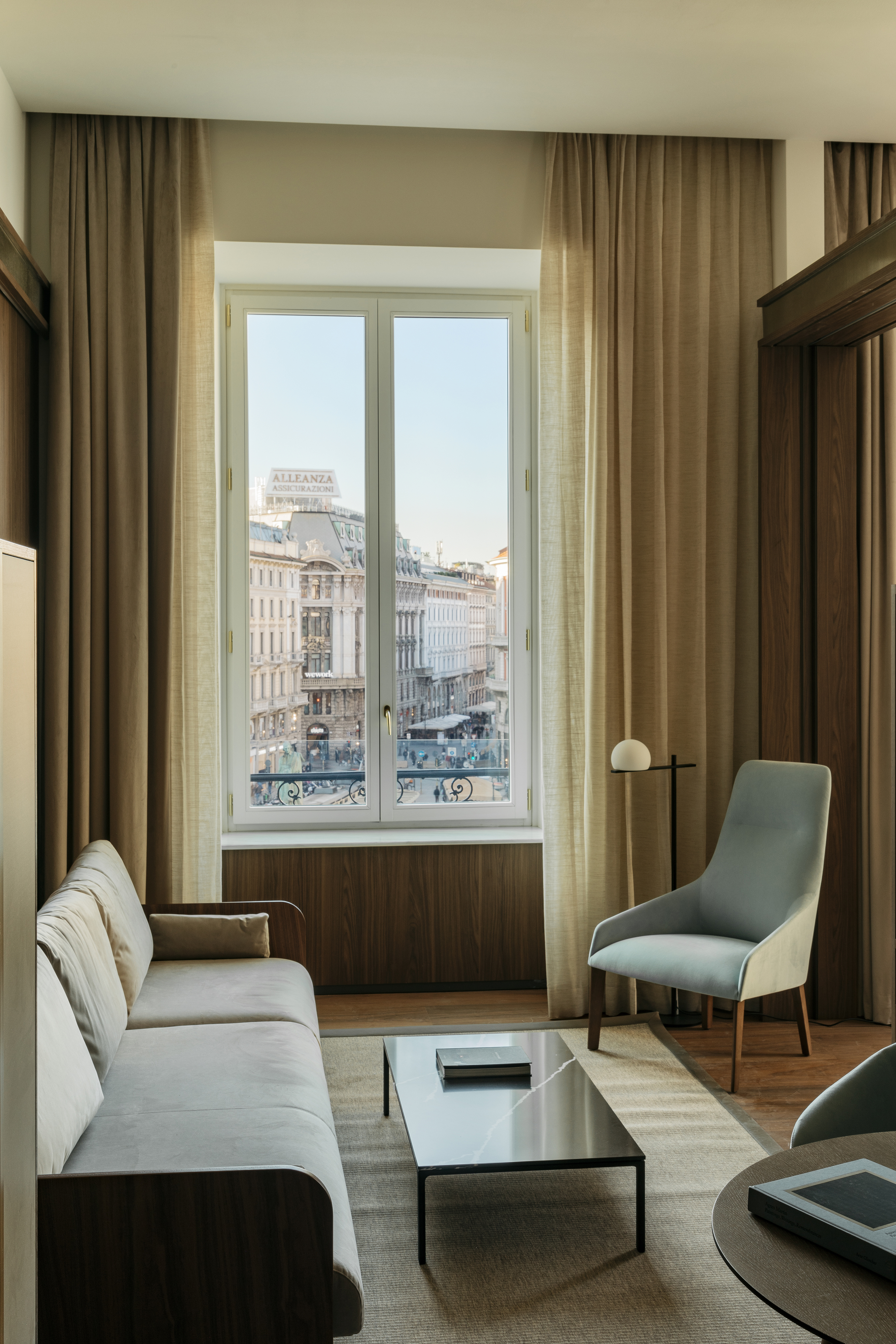 a living room with a couch and a window