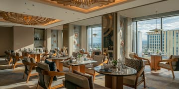 a room with tables and chairs