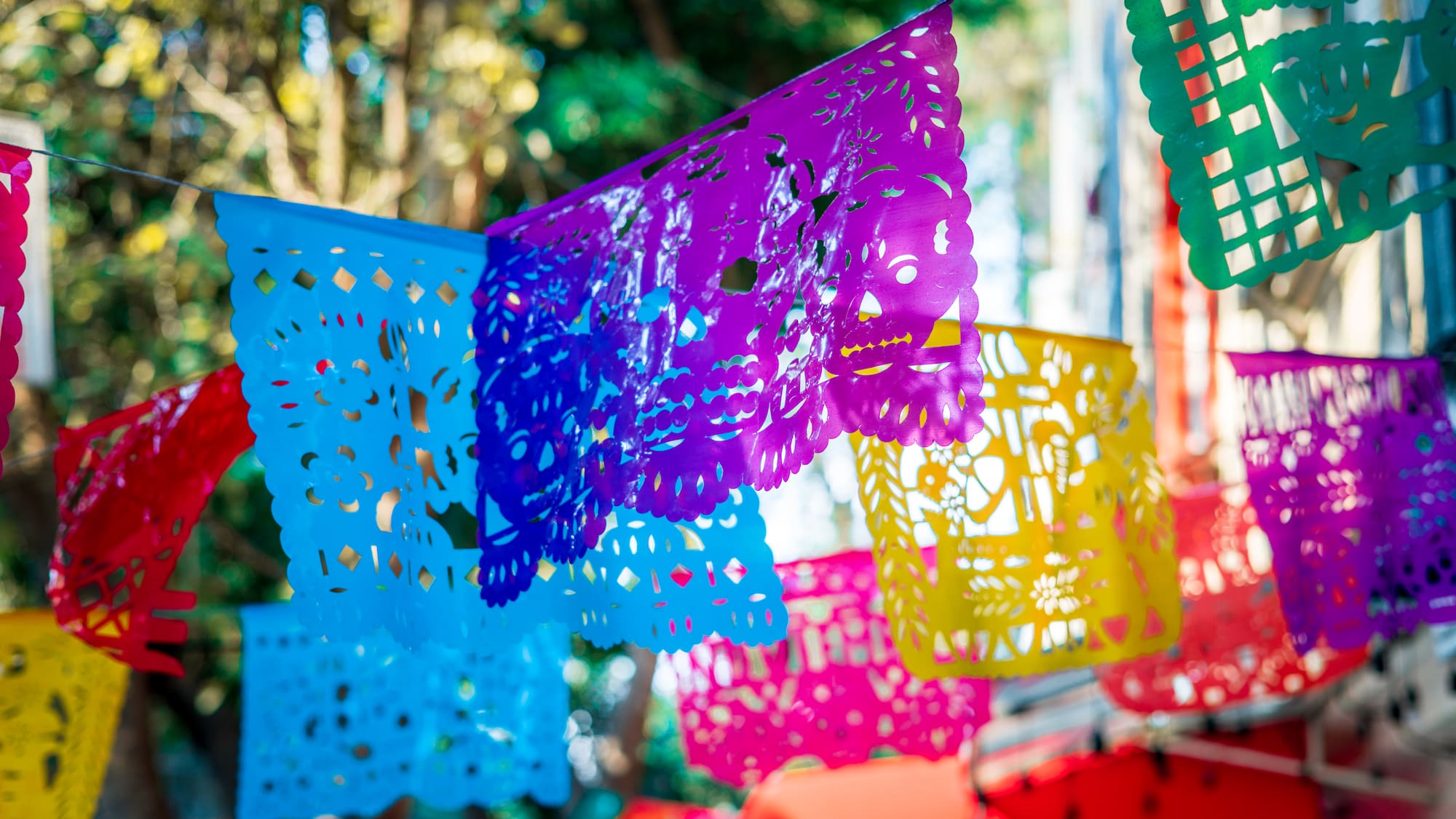 a colorful paper flags from a string