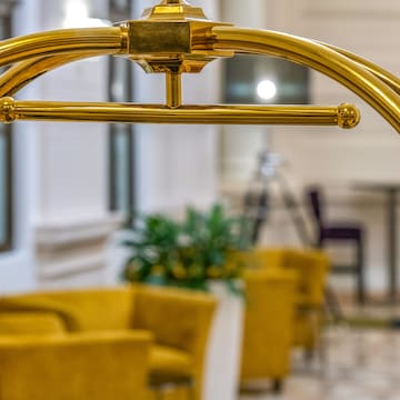 a gold object in a room