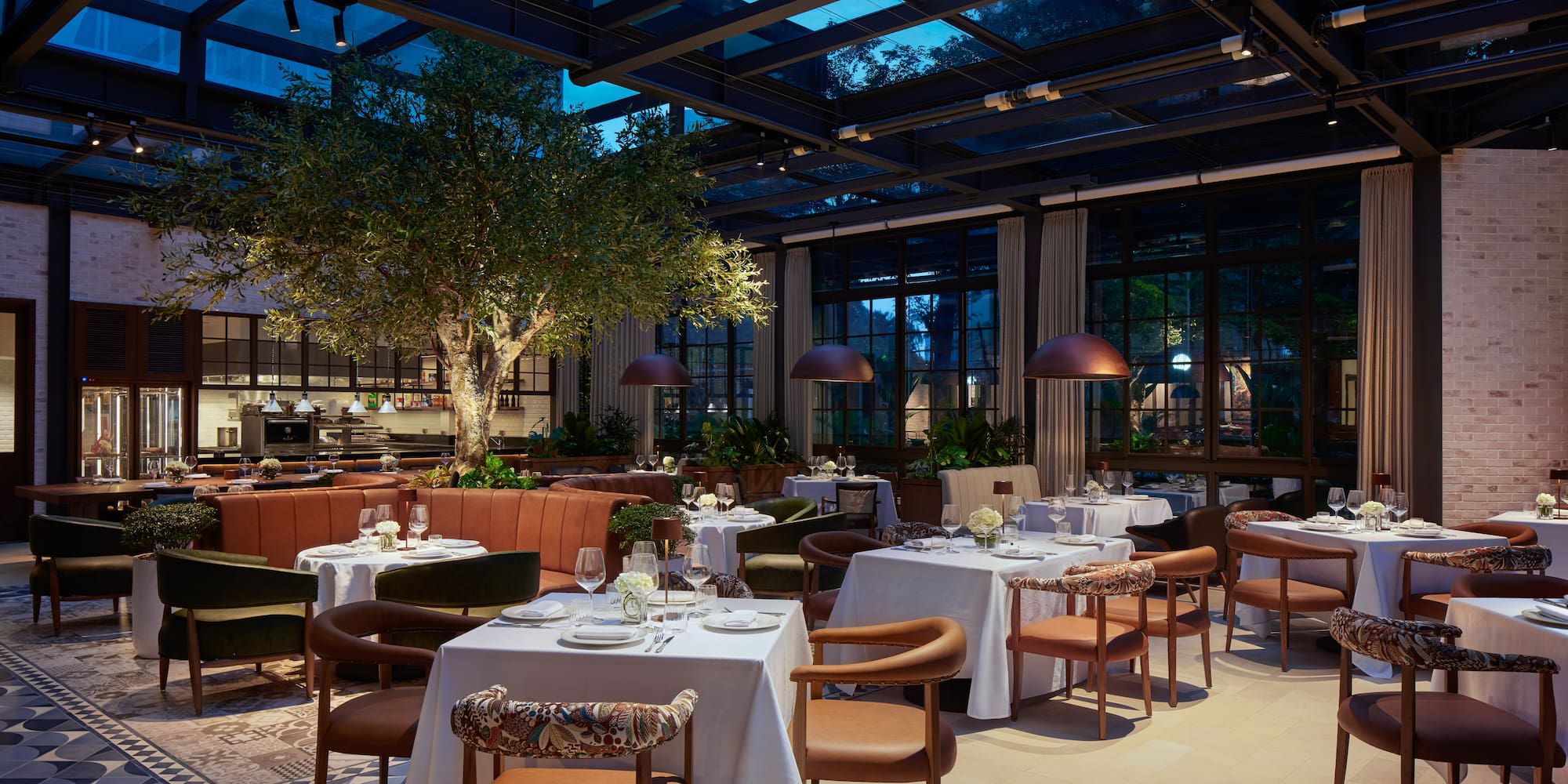 a restaurant with tables and chairs