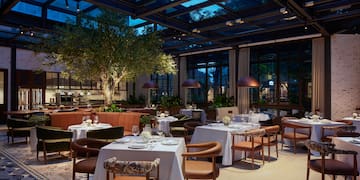 a restaurant with tables and chairs