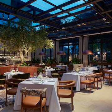 a restaurant with tables and chairs