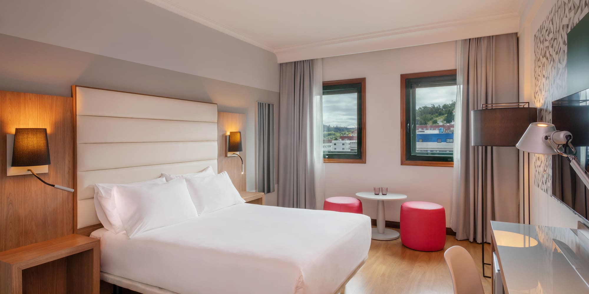 a room with a bed and a table