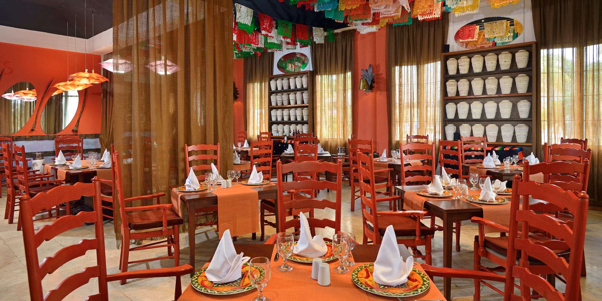 a room with tables and chairs