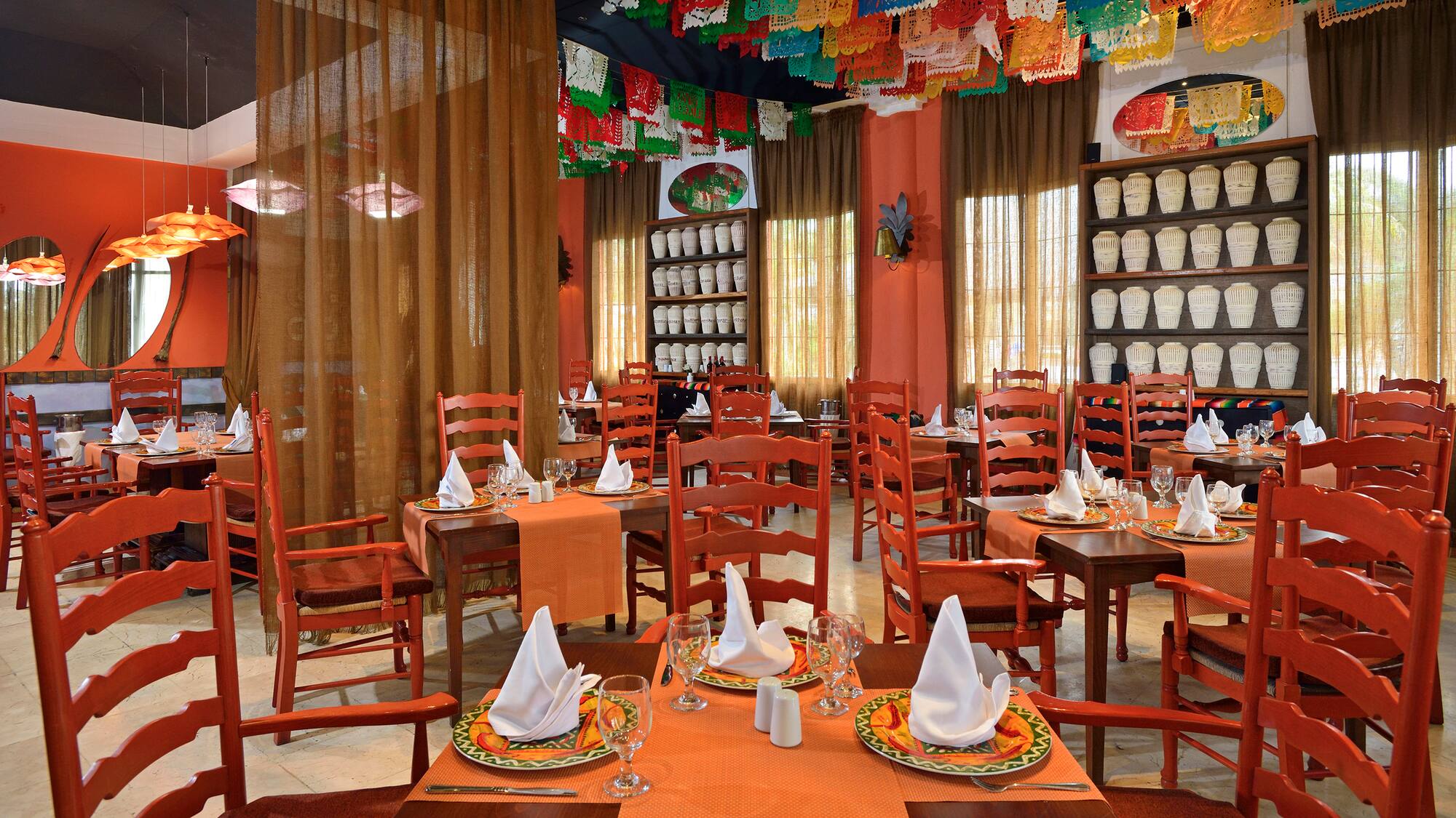 a room with tables and chairs