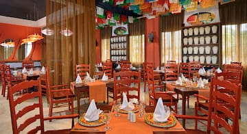 a room with tables and chairs