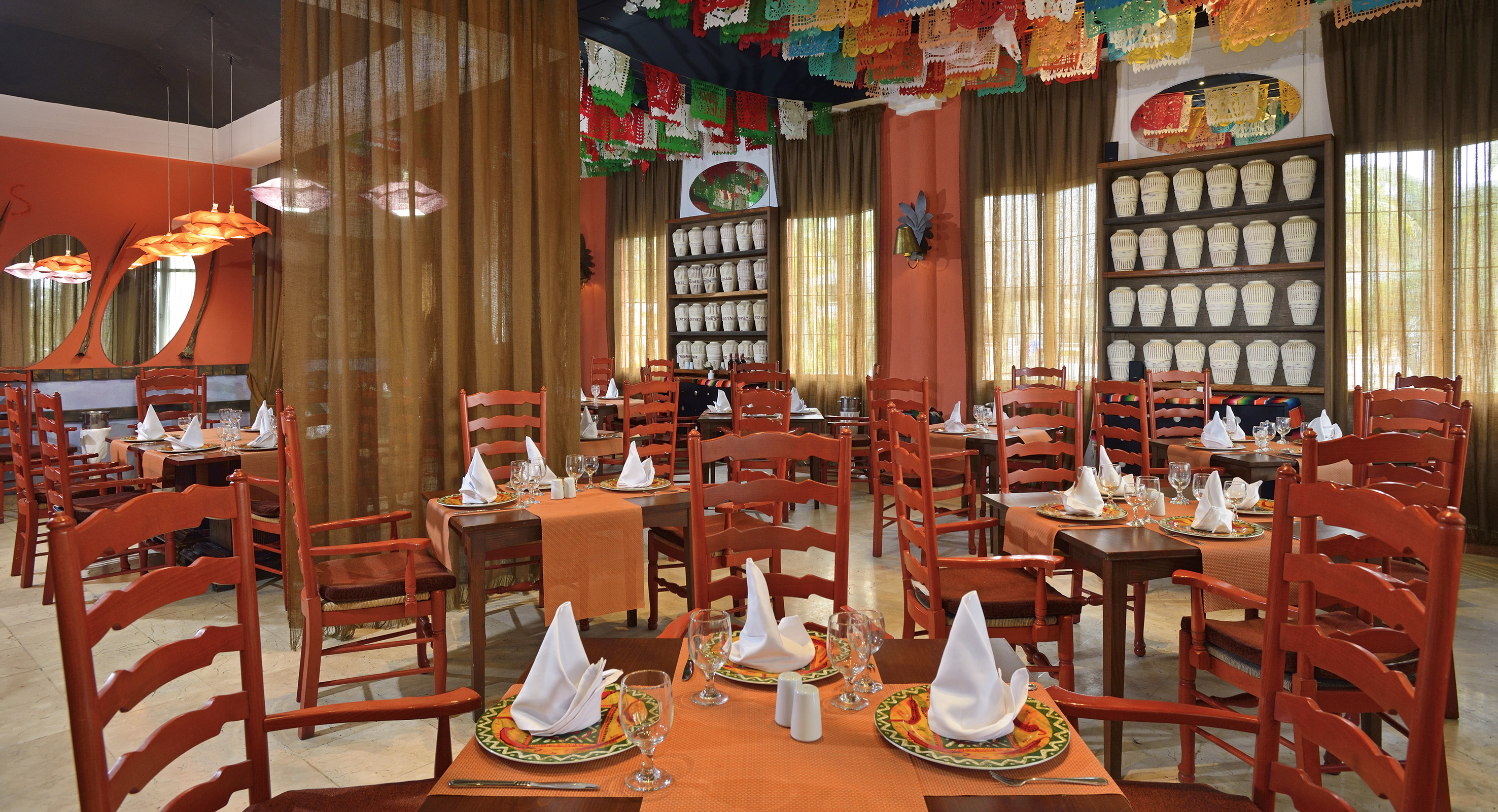 a room with tables and chairs