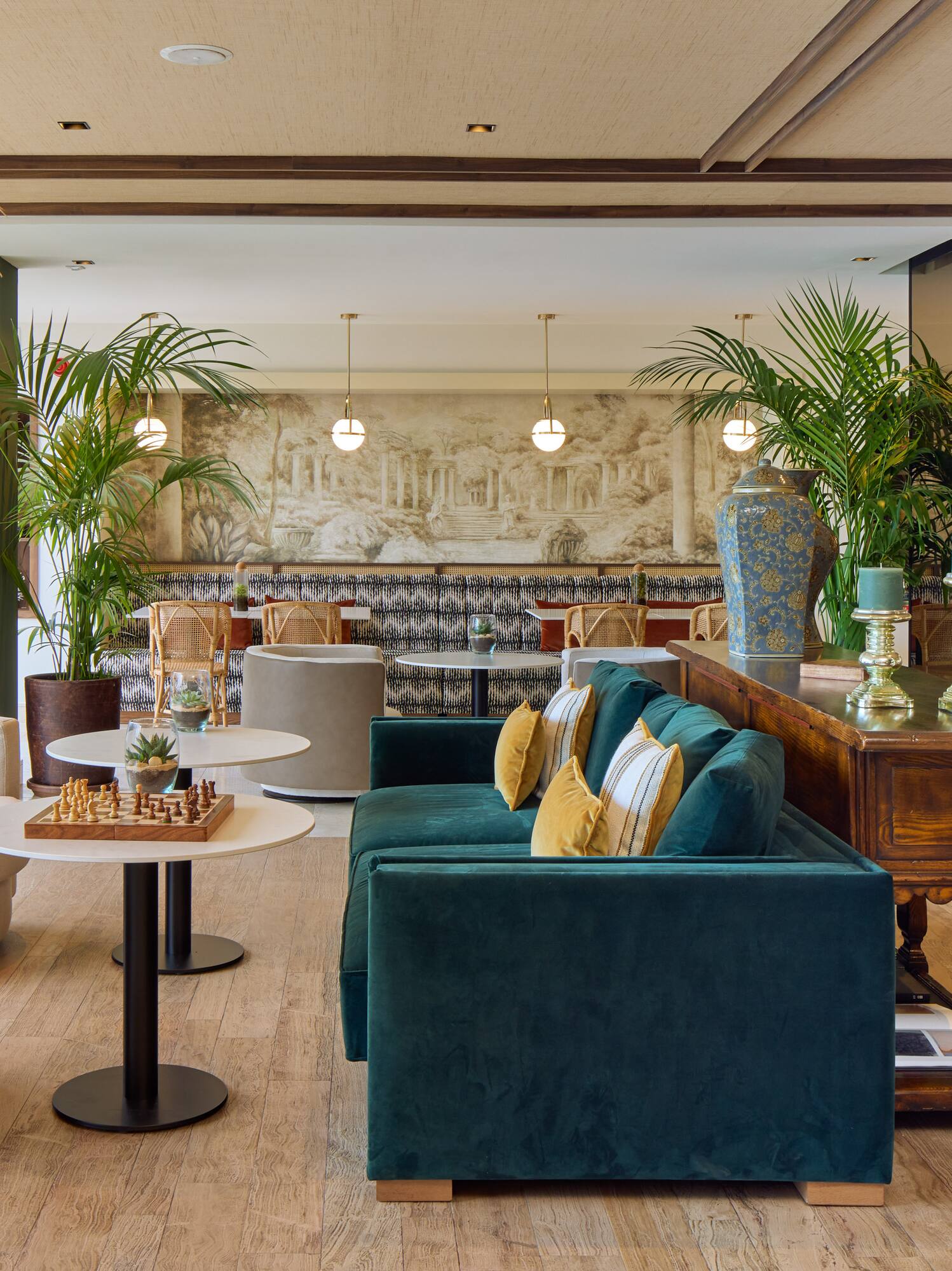 a room with a couch and tables