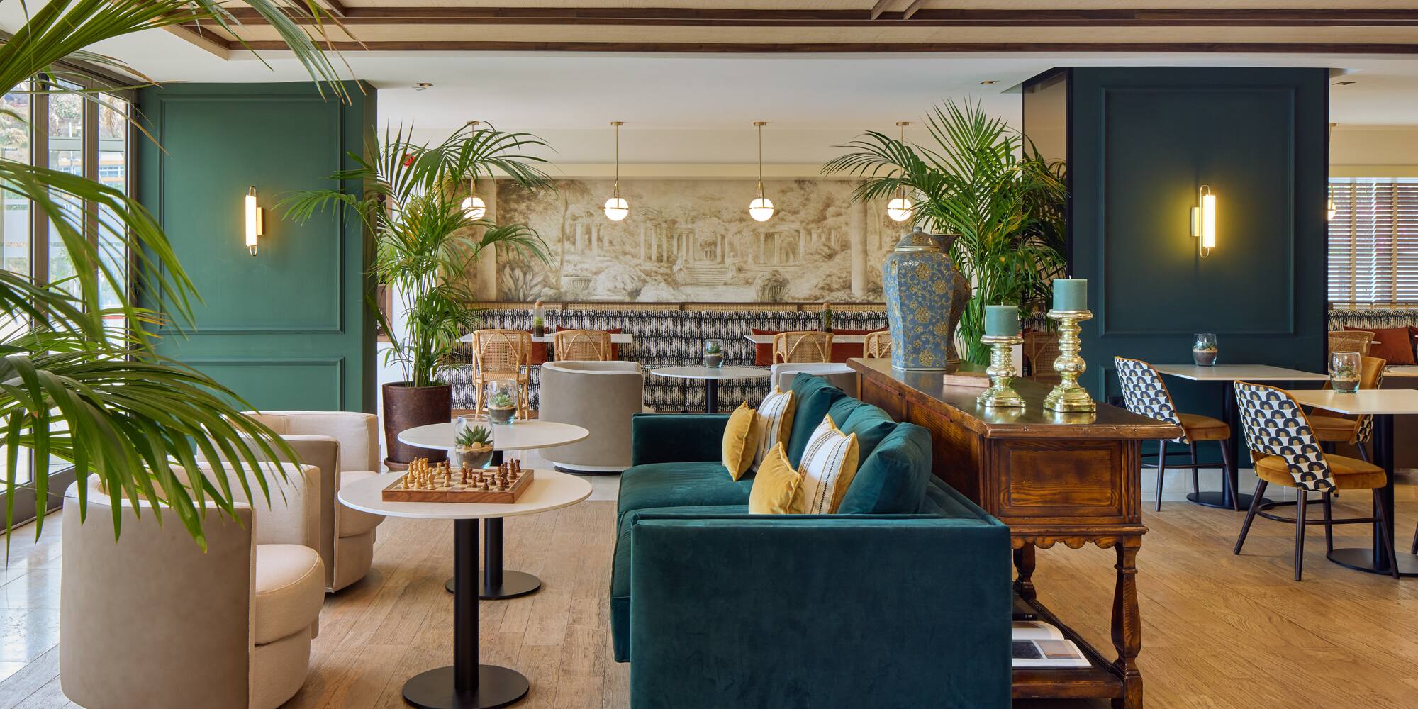 a room with a couch and tables