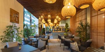 a restaurant with tables and chairs