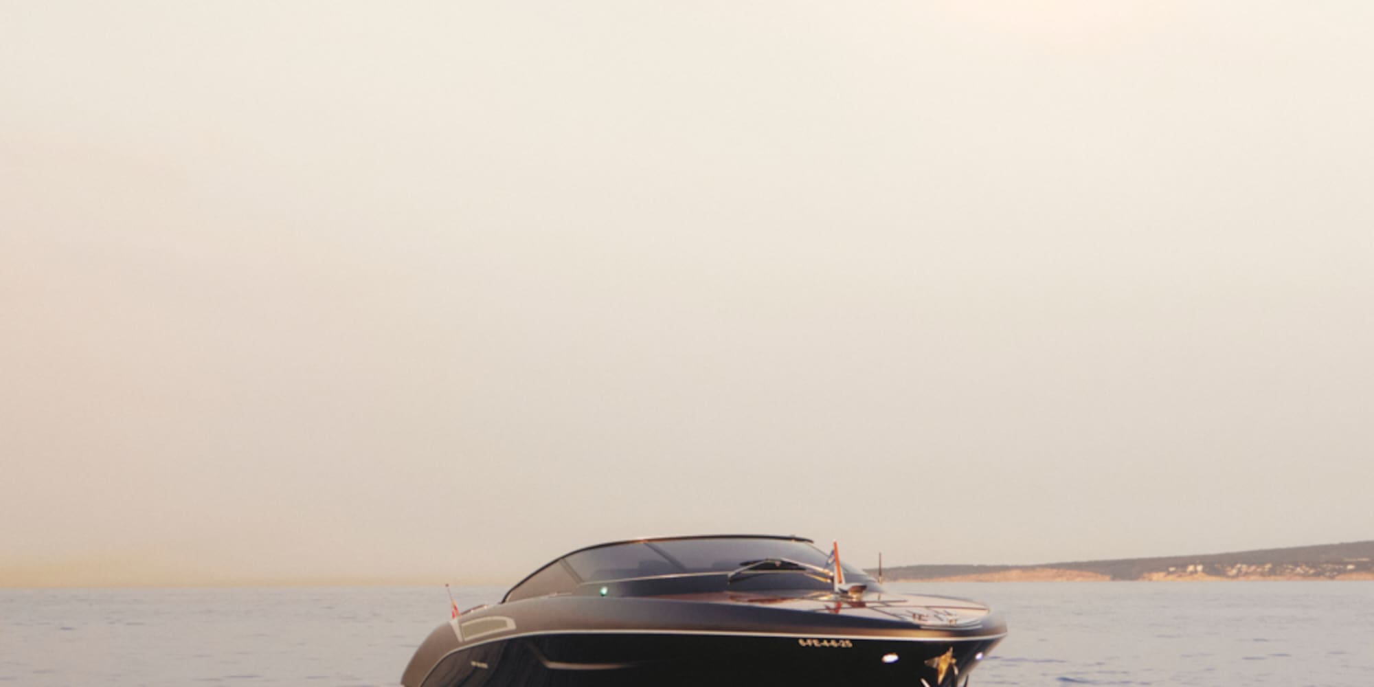 a black boat in the water