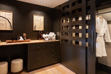 a bathroom with a black door