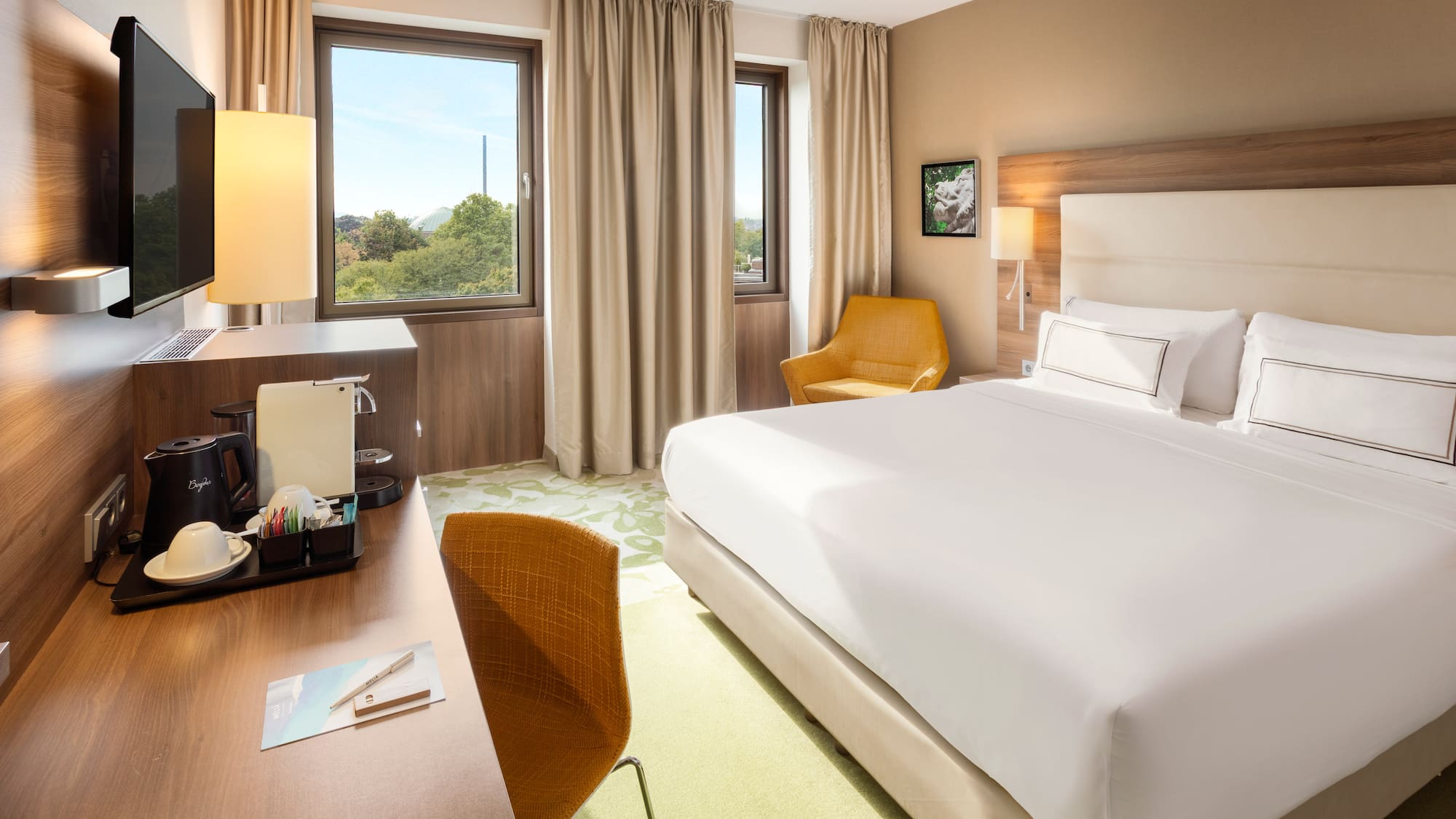 a room with a bed and a desk