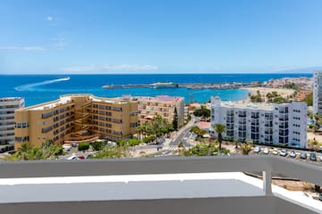 a view of a city from a balcony