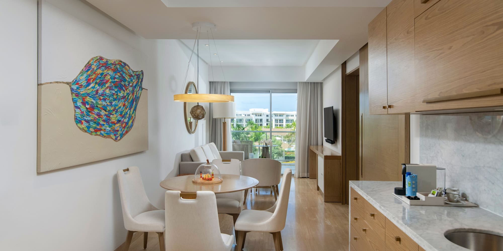 a room with a table and chairs