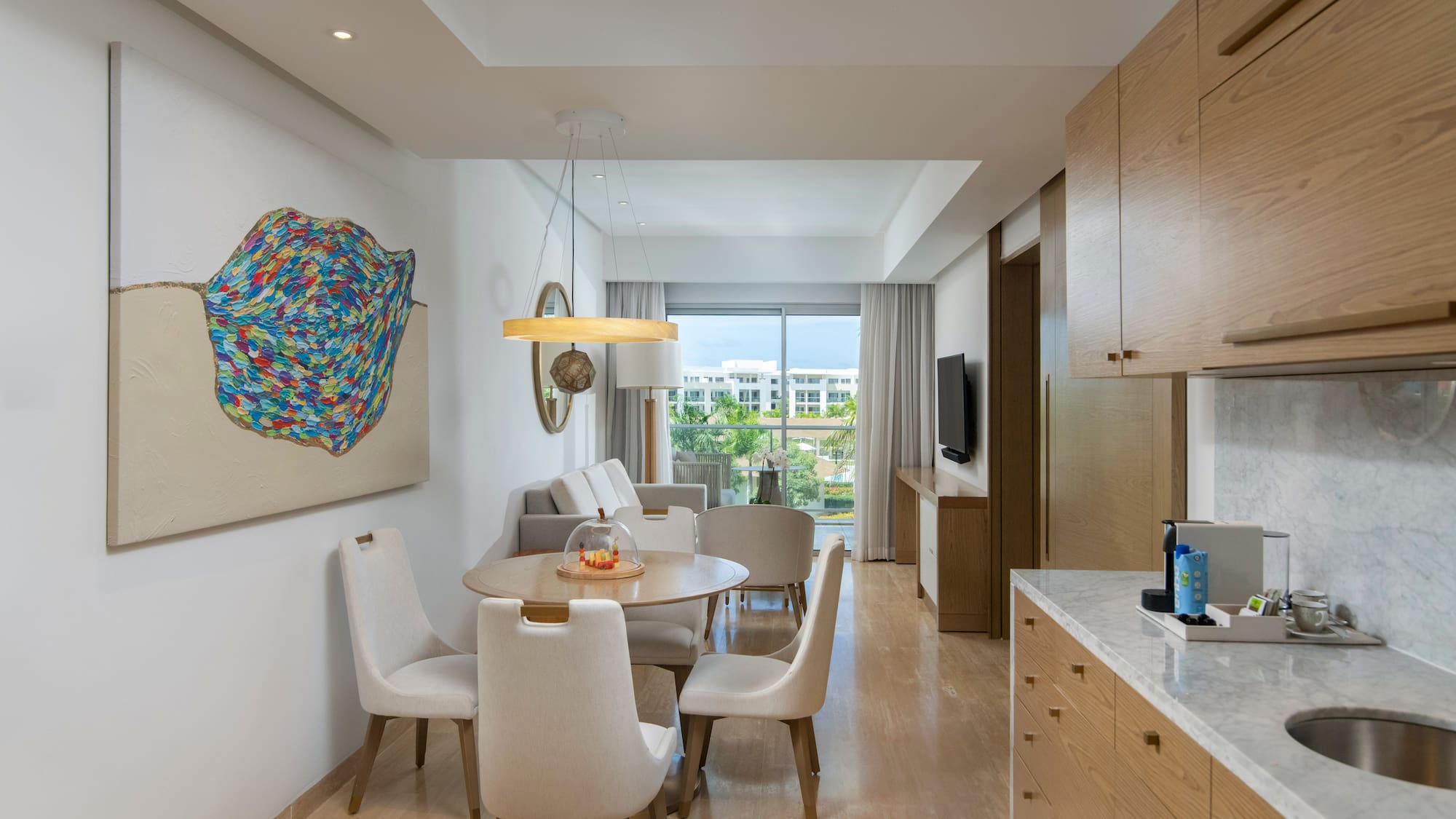 a room with a table and chairs