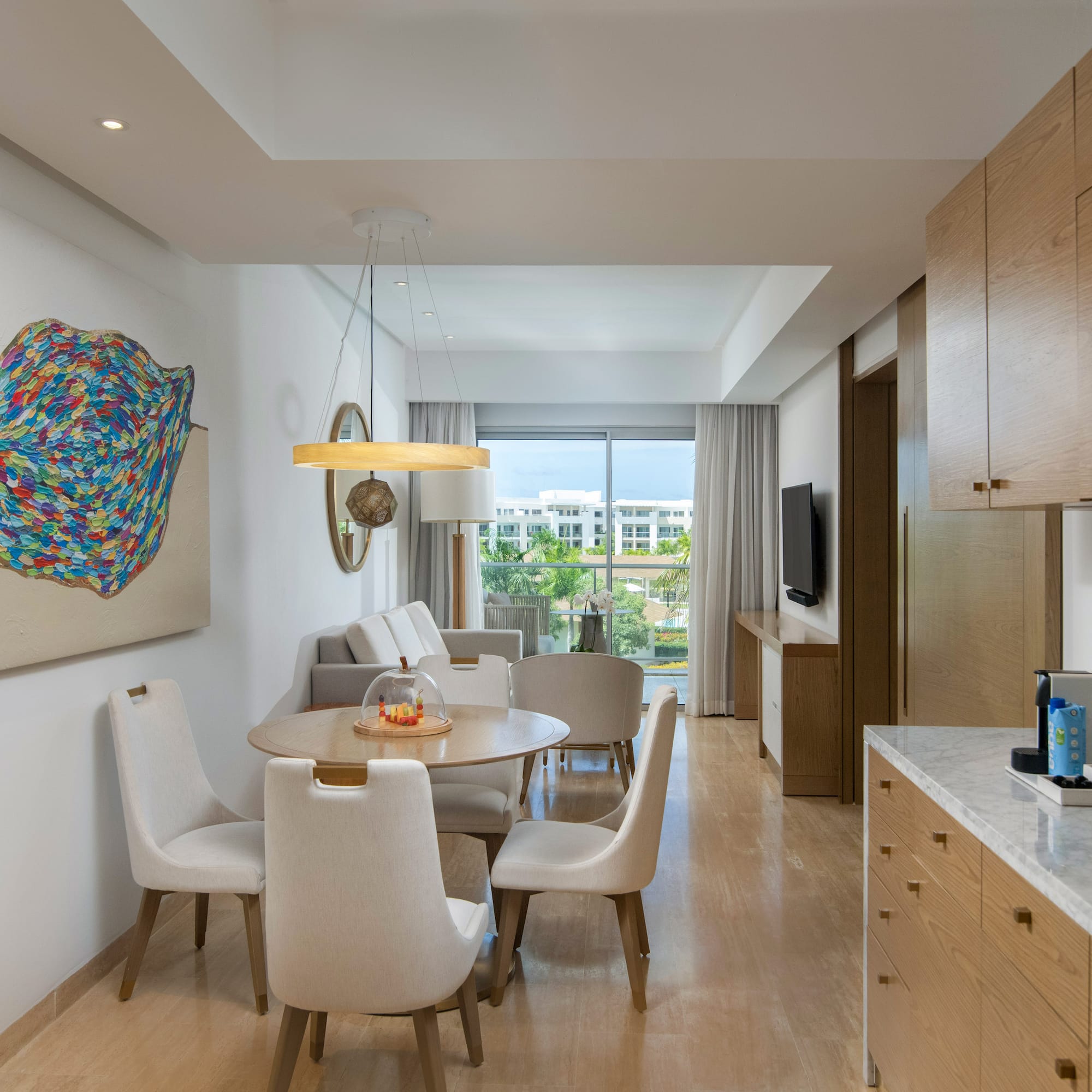 a room with a table and chairs