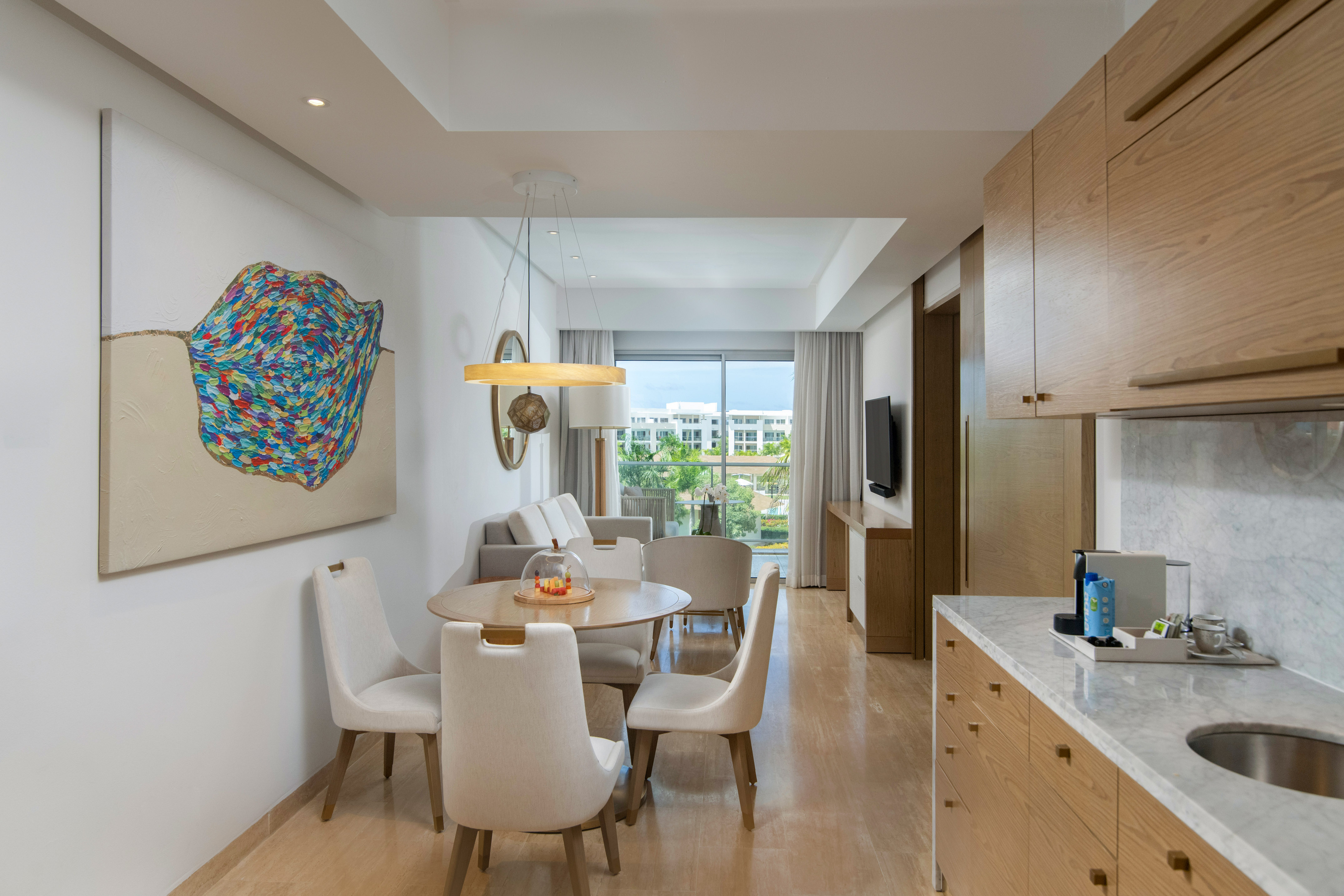 a room with a table and chairs