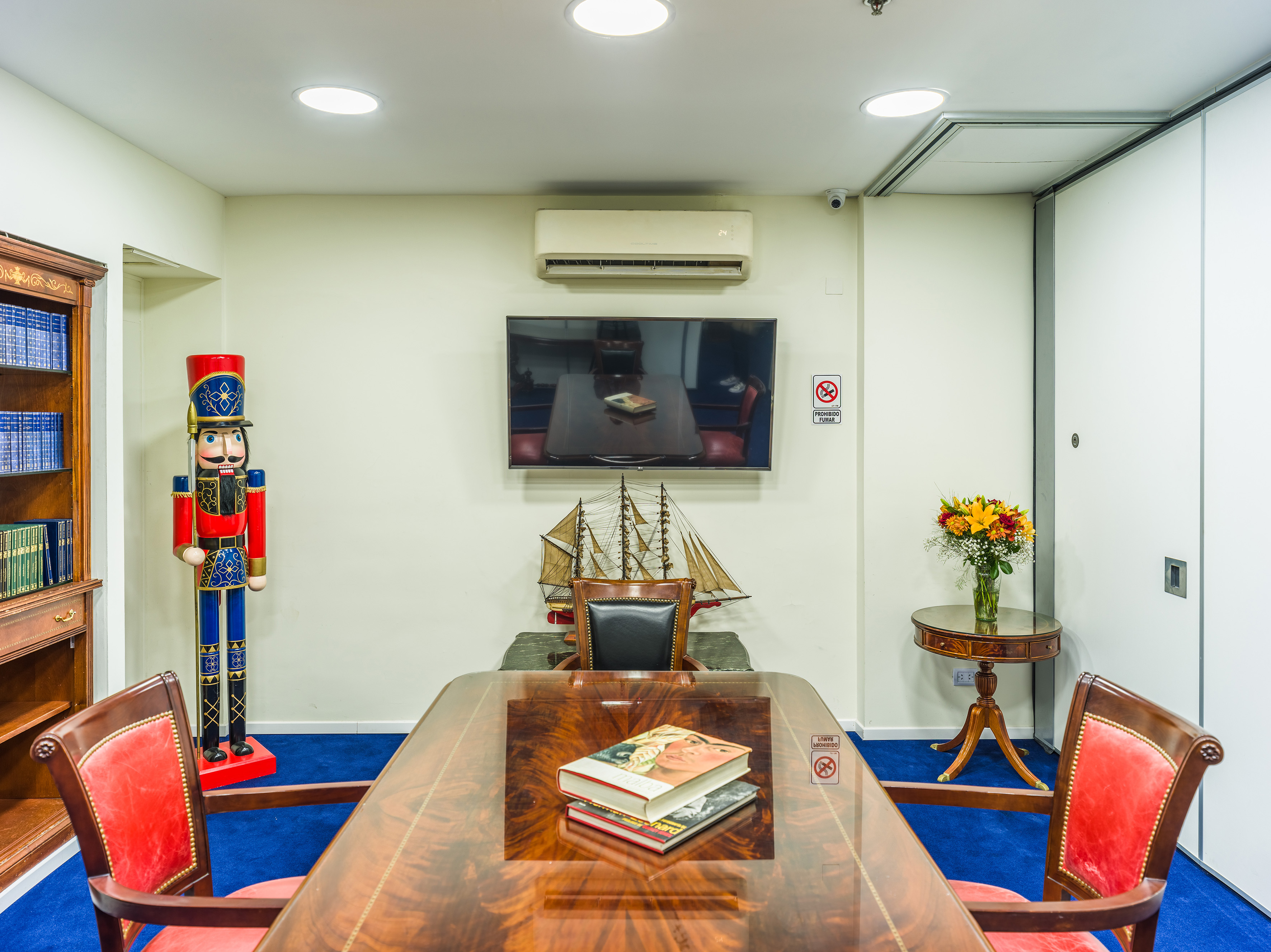 a room with a table and chairs