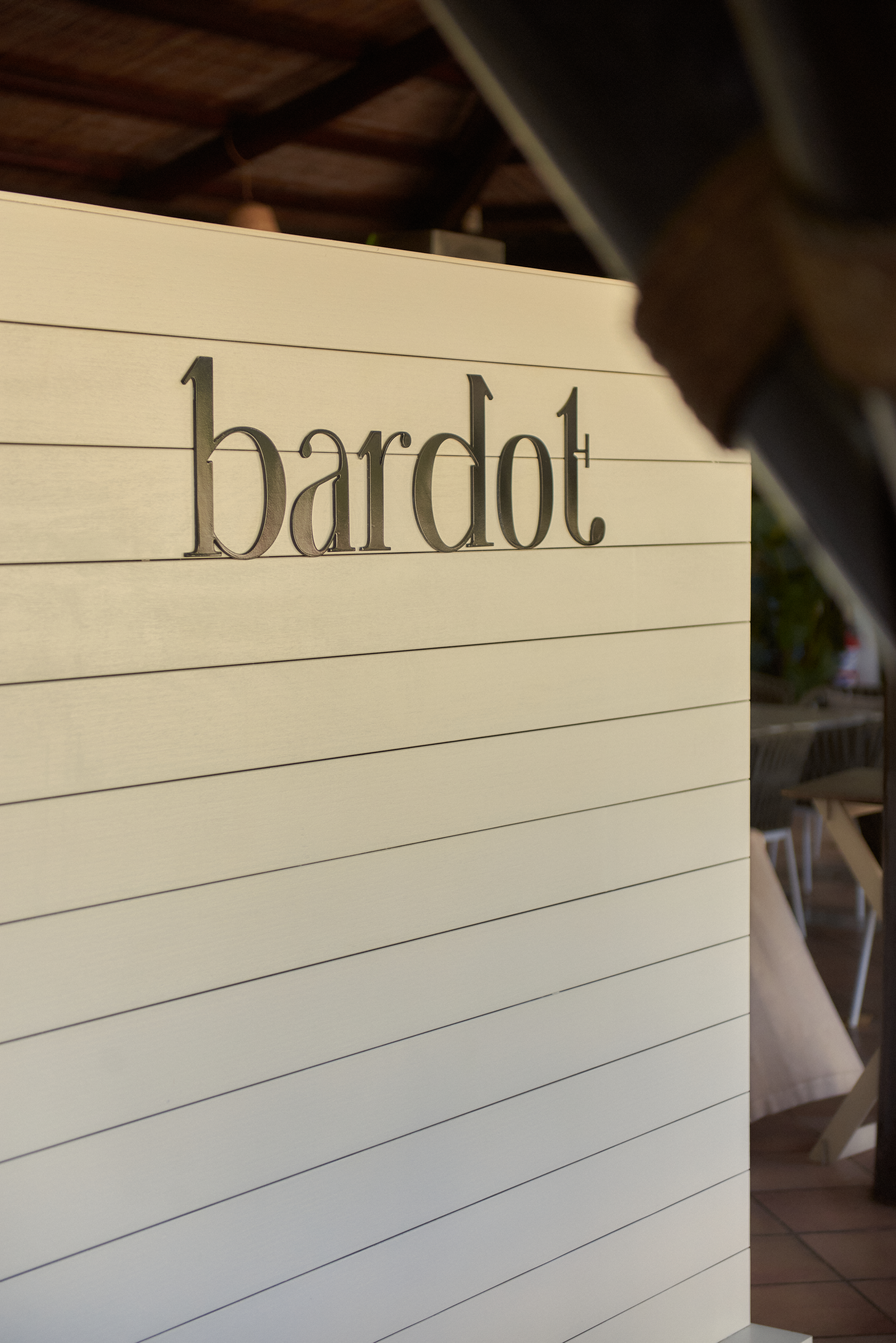 a sign with black text on it