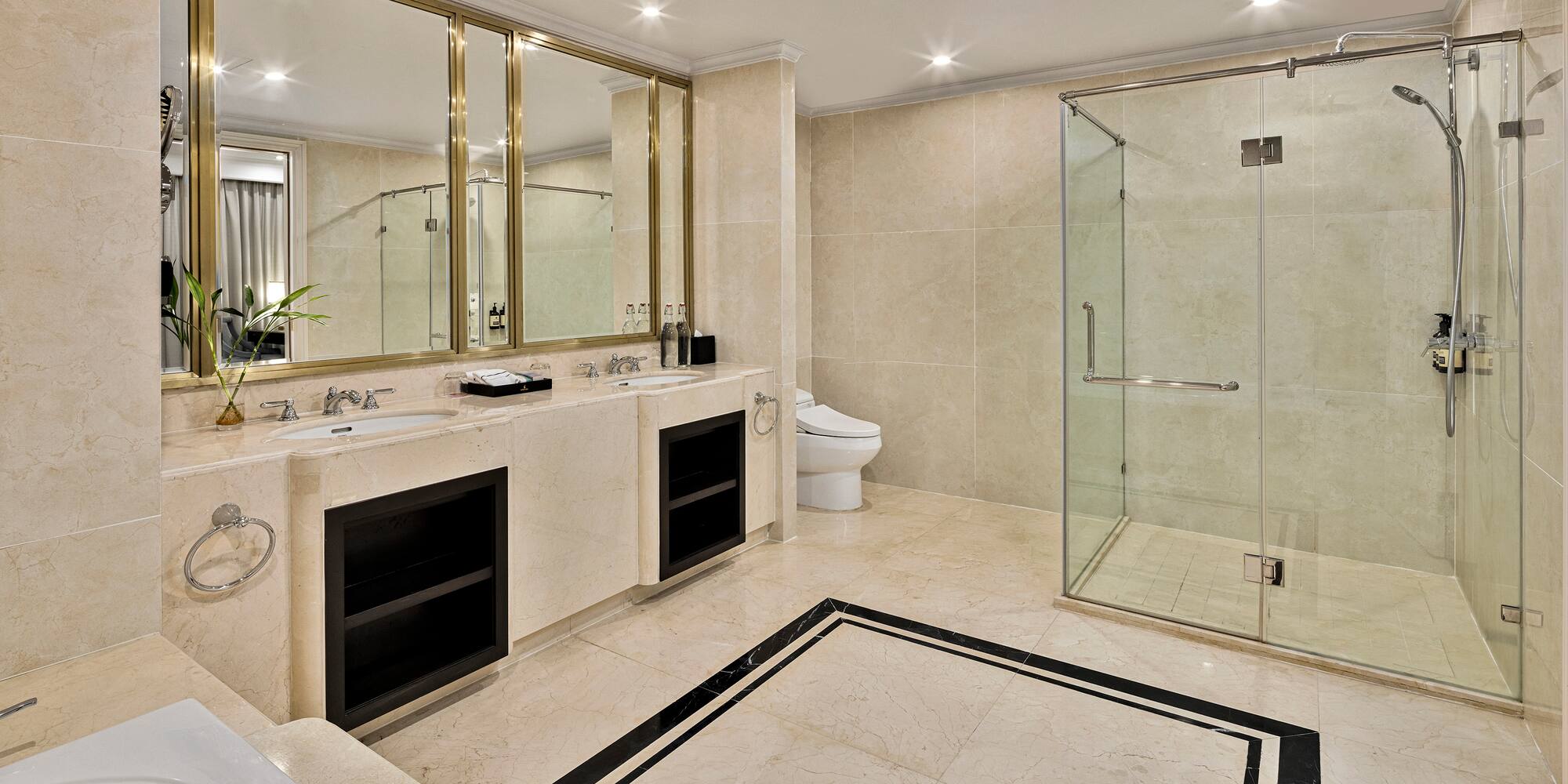 a bathroom with a shower and sink