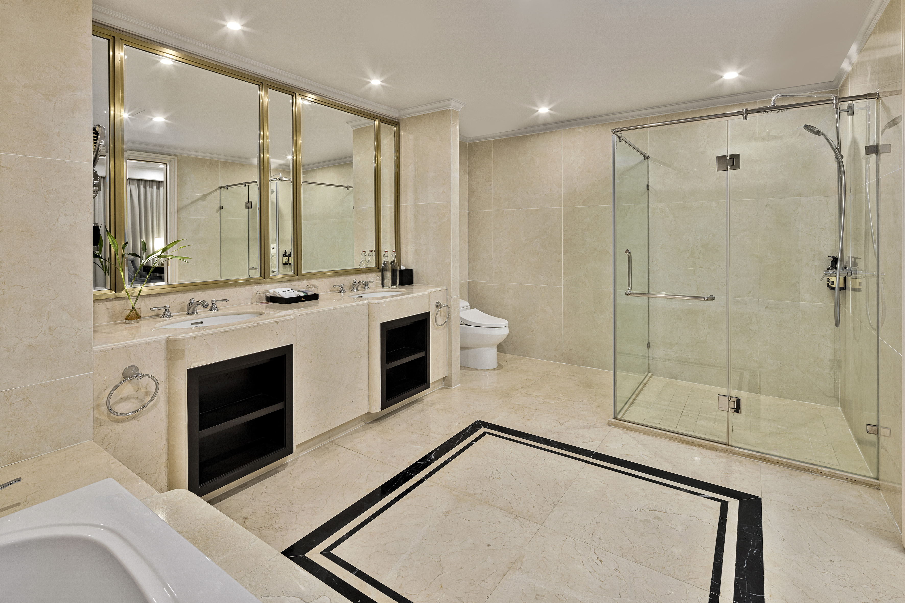 a bathroom with a shower and sink
