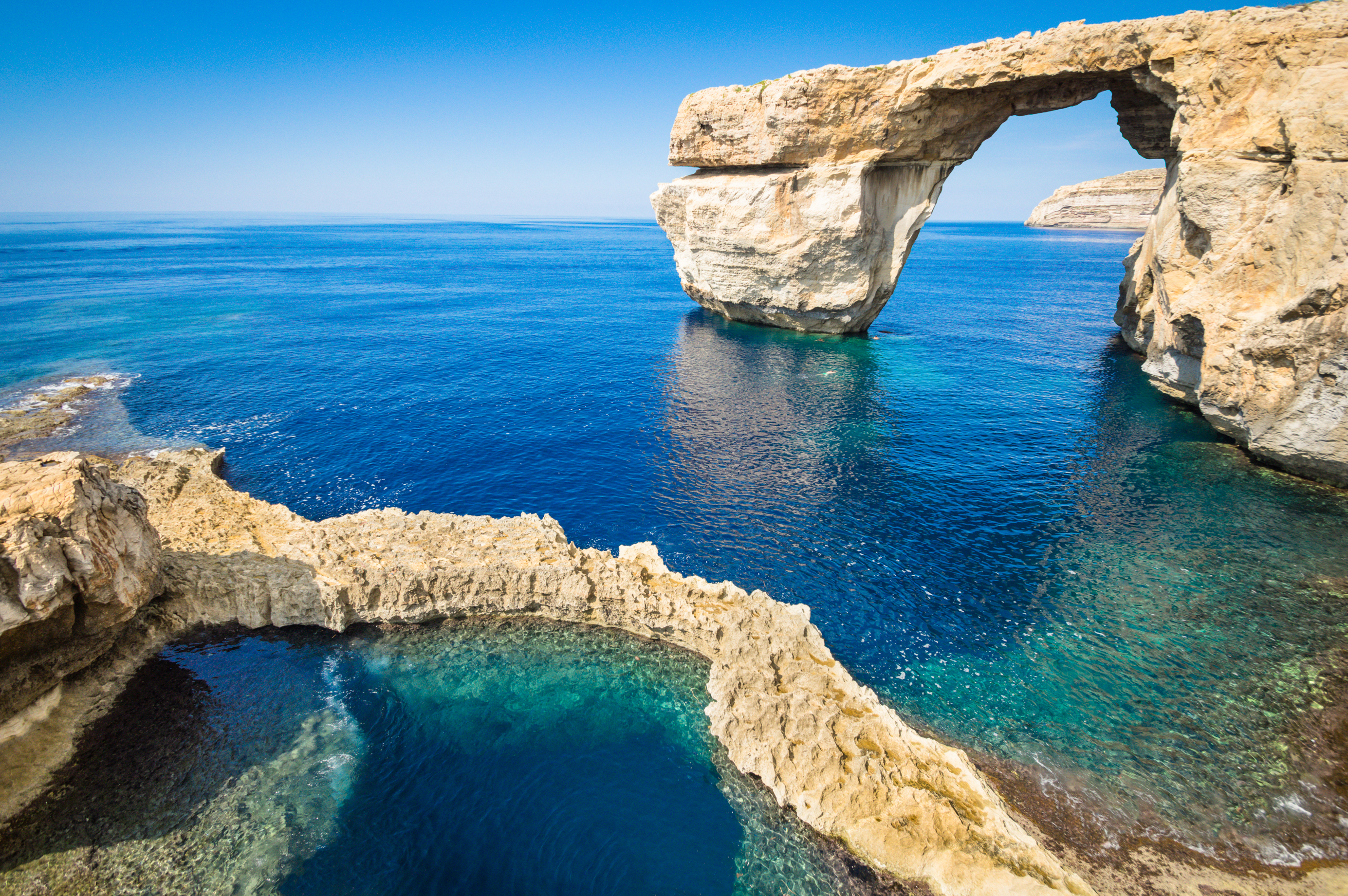 Azure Window natural arch over clear blue Gozo sea, Malta