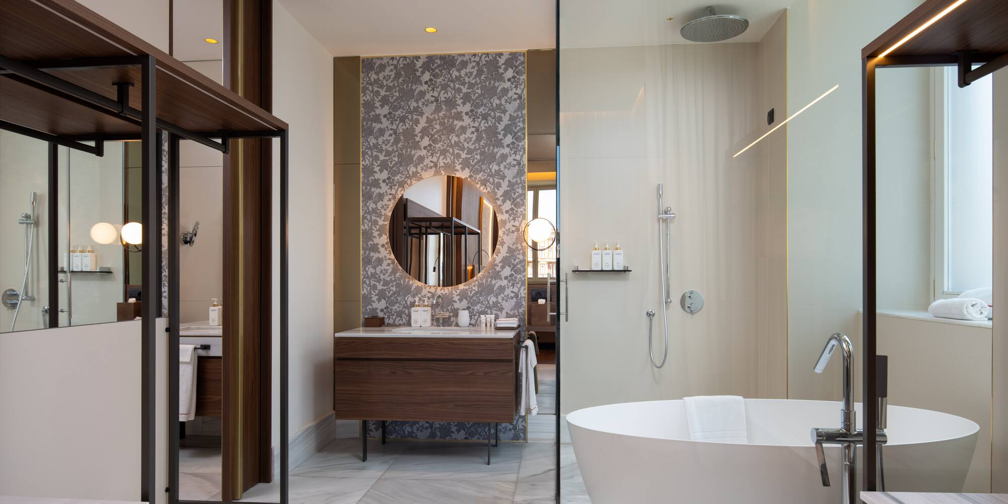 a bathroom with a tub and a shower