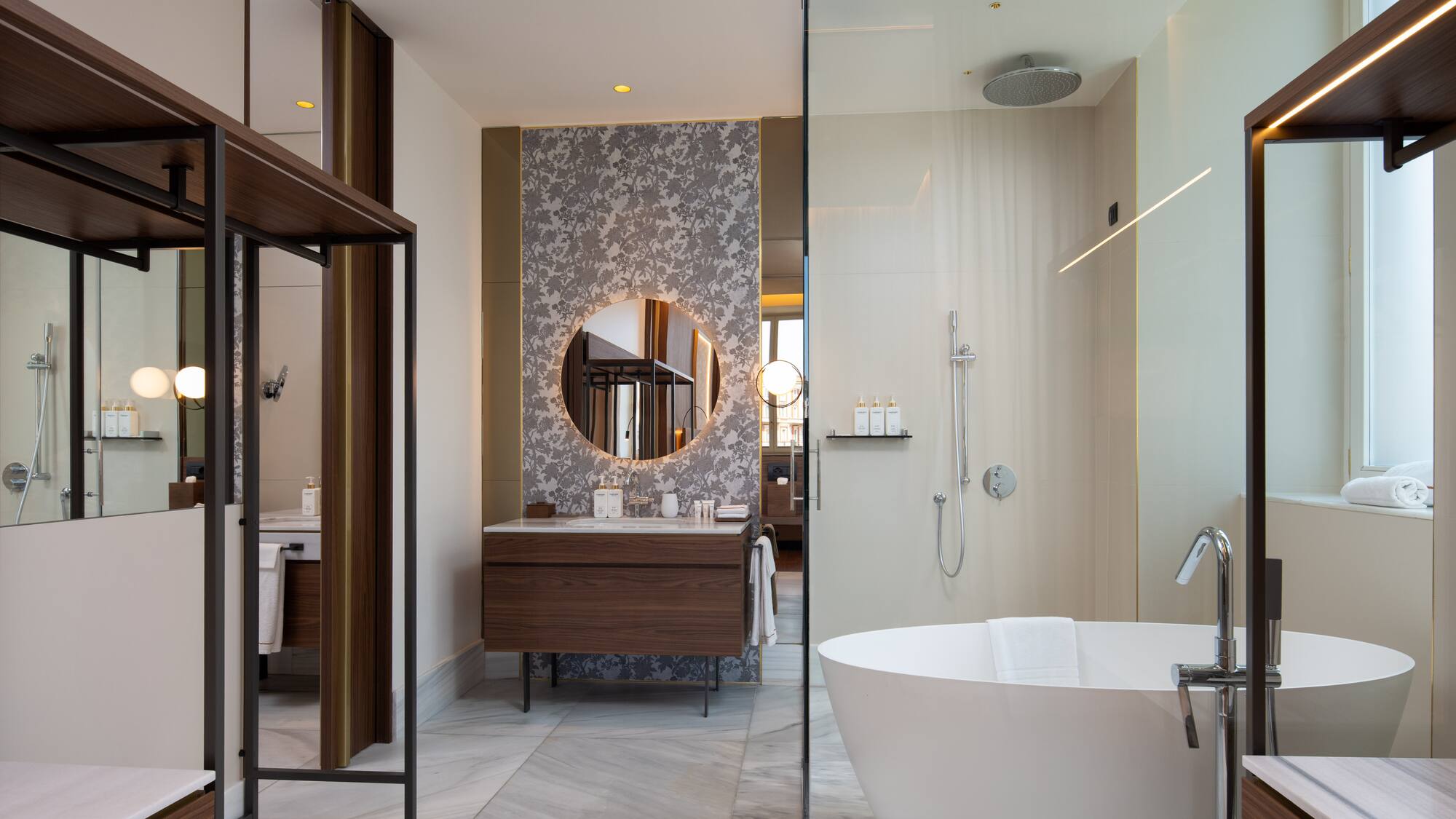 a bathroom with a tub and a shower