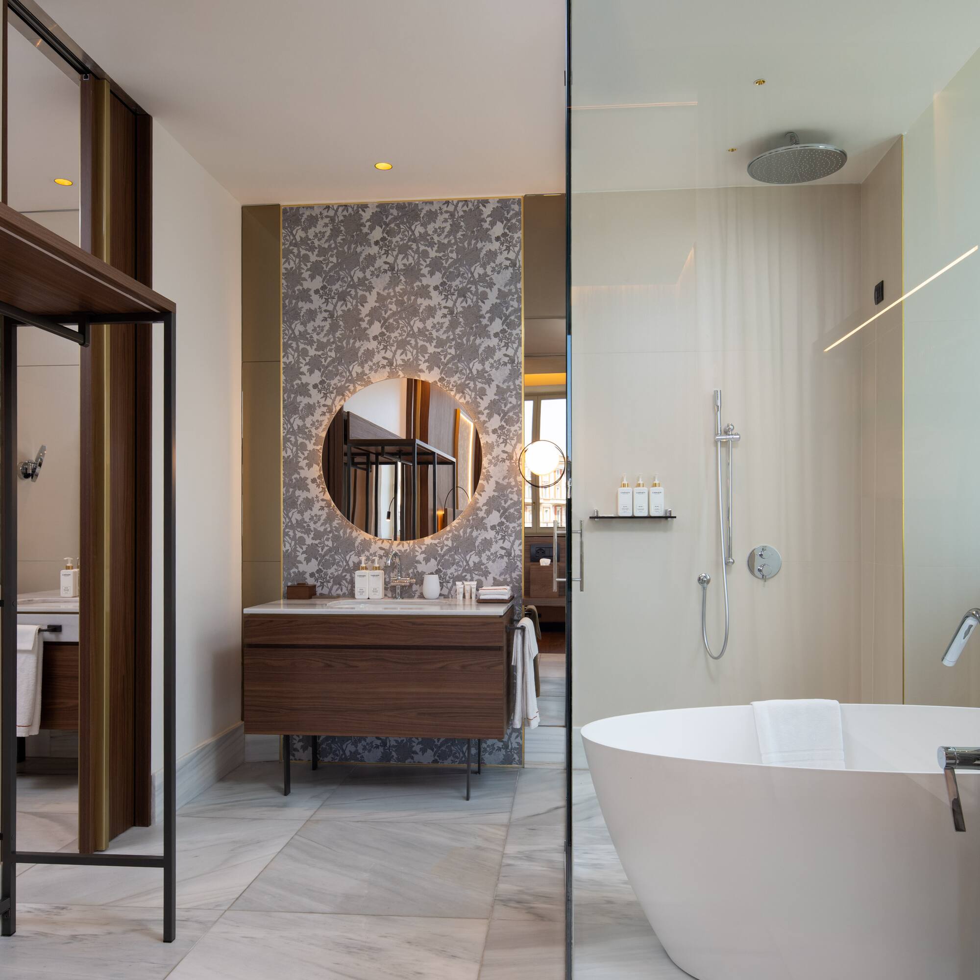 a bathroom with a tub and a shower