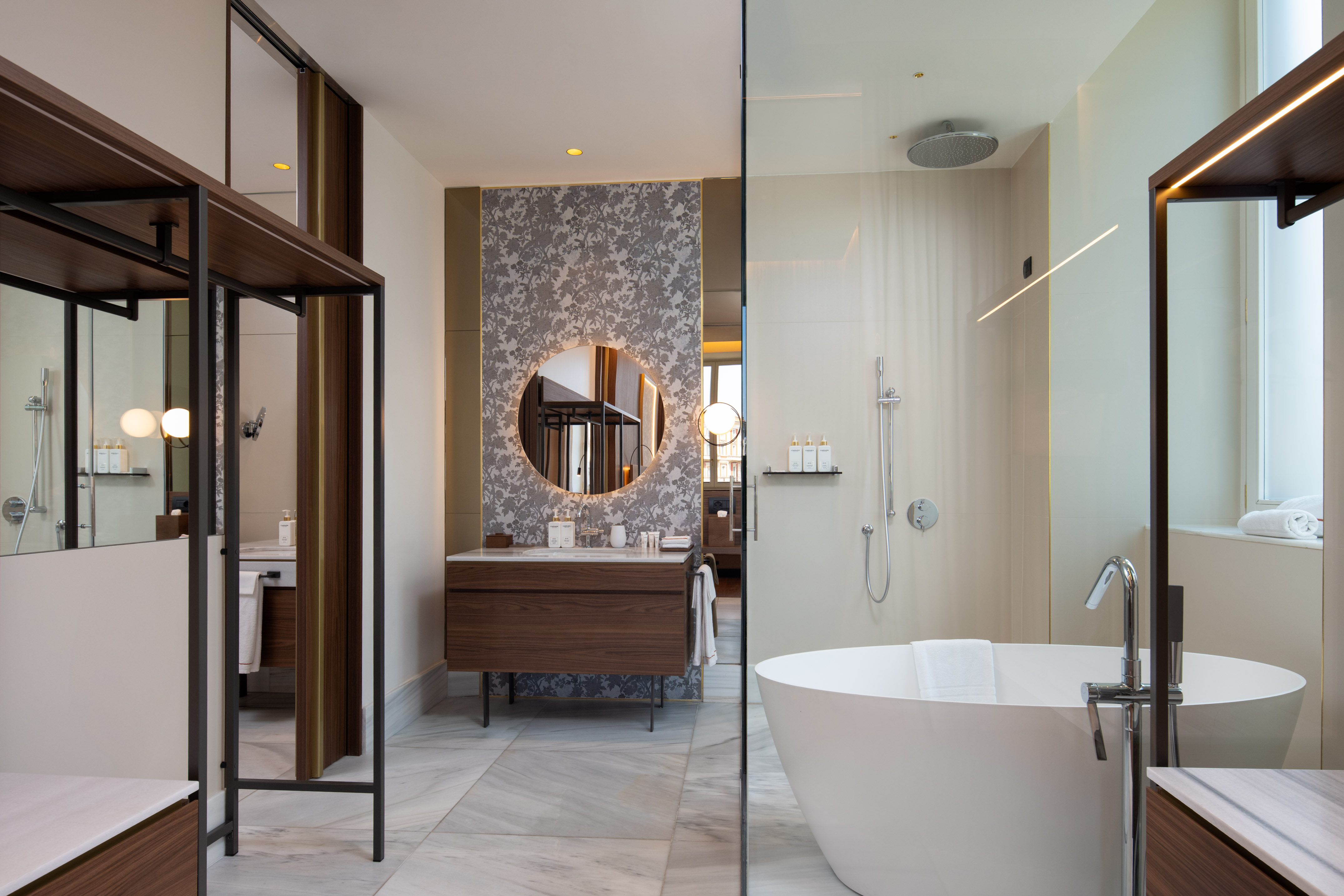 a bathroom with a tub and a shower