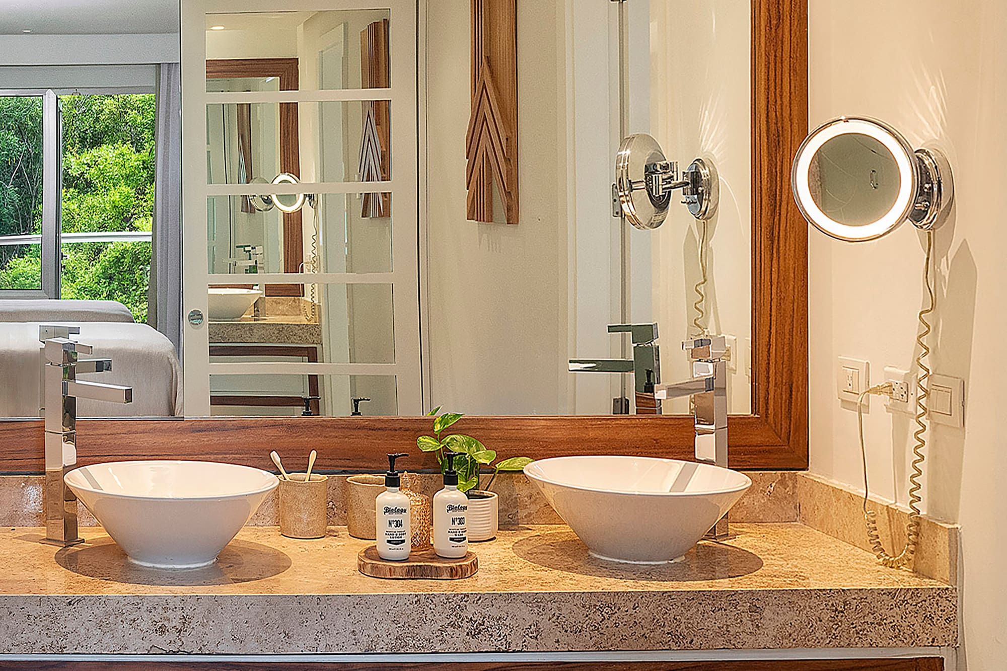 a bathroom with a mirror and two sinks