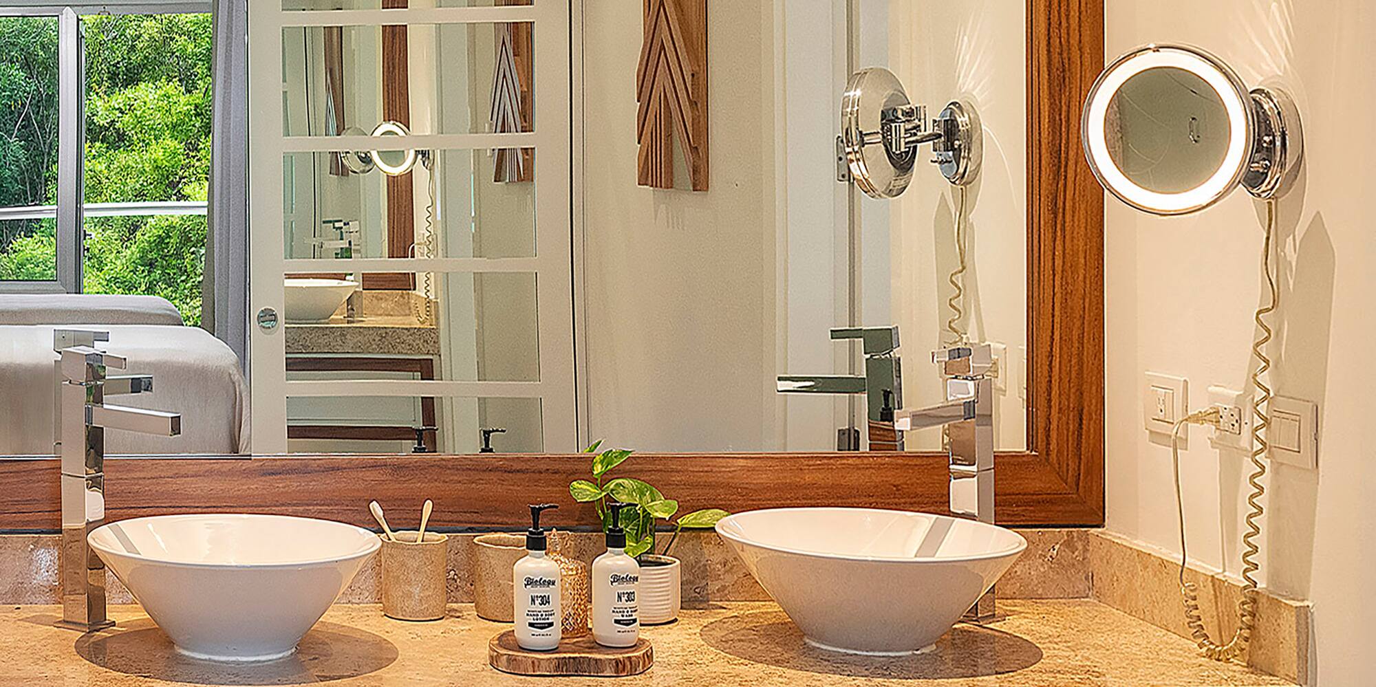 a bathroom with a mirror and two sinks