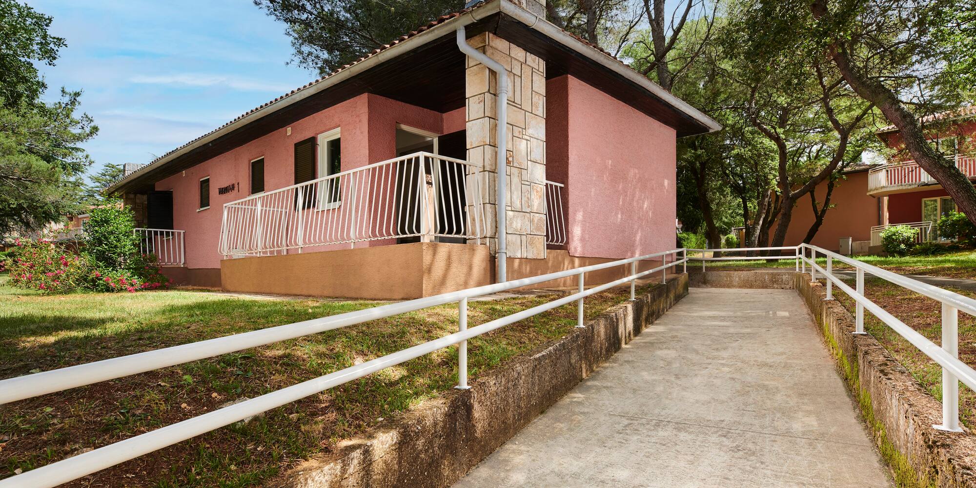 a house with a ramp leading to it